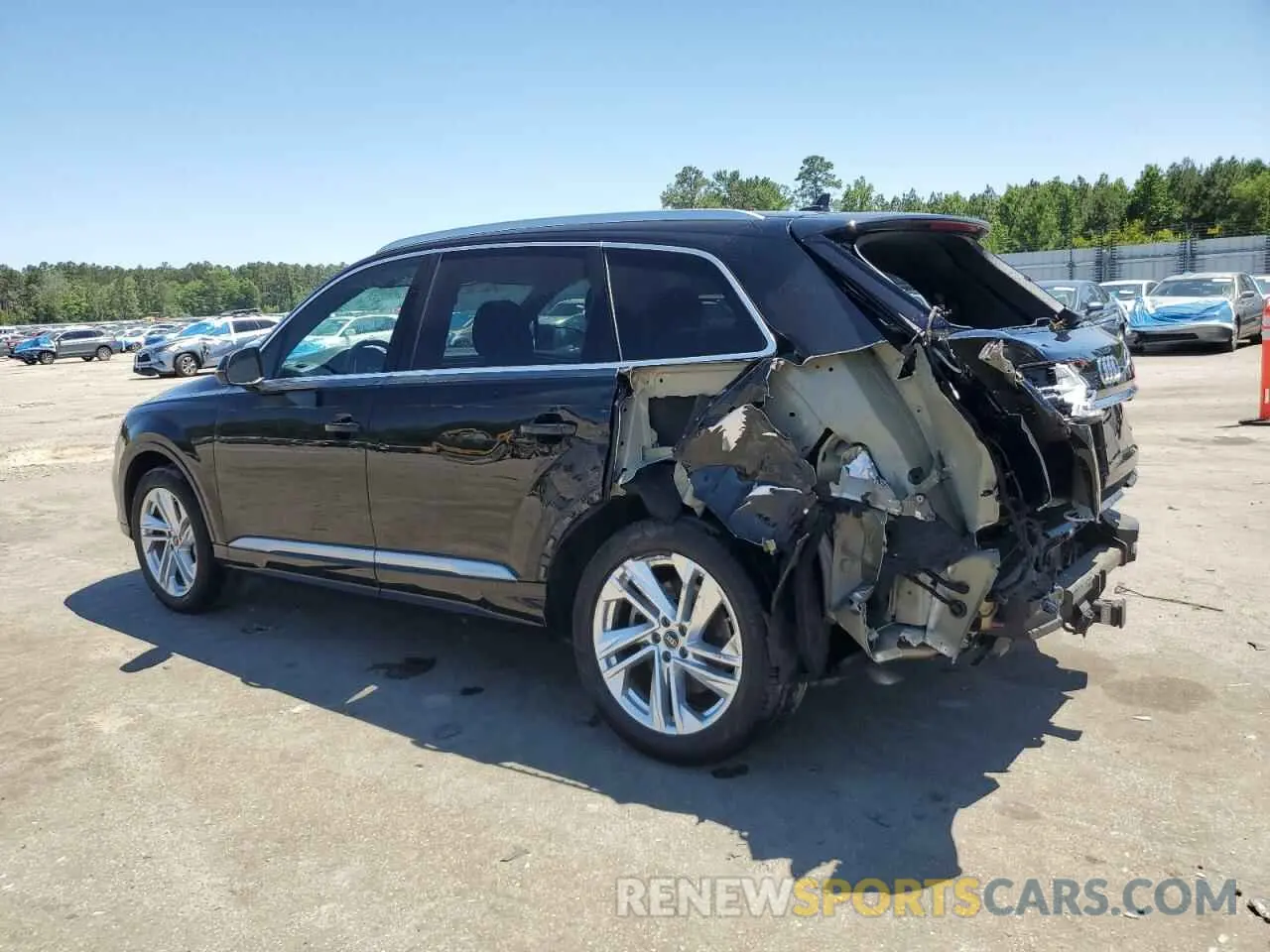 2 fotografías del automóvil dañado WA1ACBF79PD012740 AUDI Q7 2023