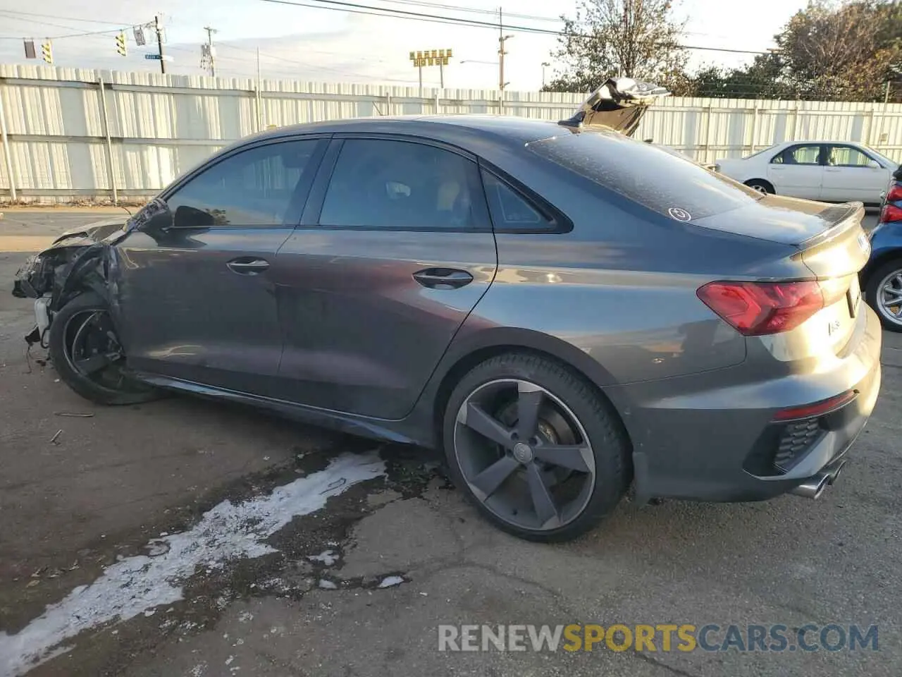 2 fotografías del automóvil dañado WAUH3CGY2NA005111 AUDI S3 2022