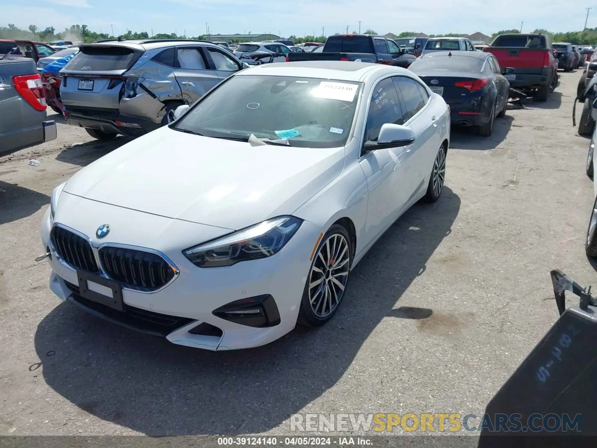 2 fotografías del automóvil dañado WBA73AK02M7H61005 BMW 228I GRAN COUPE 2021