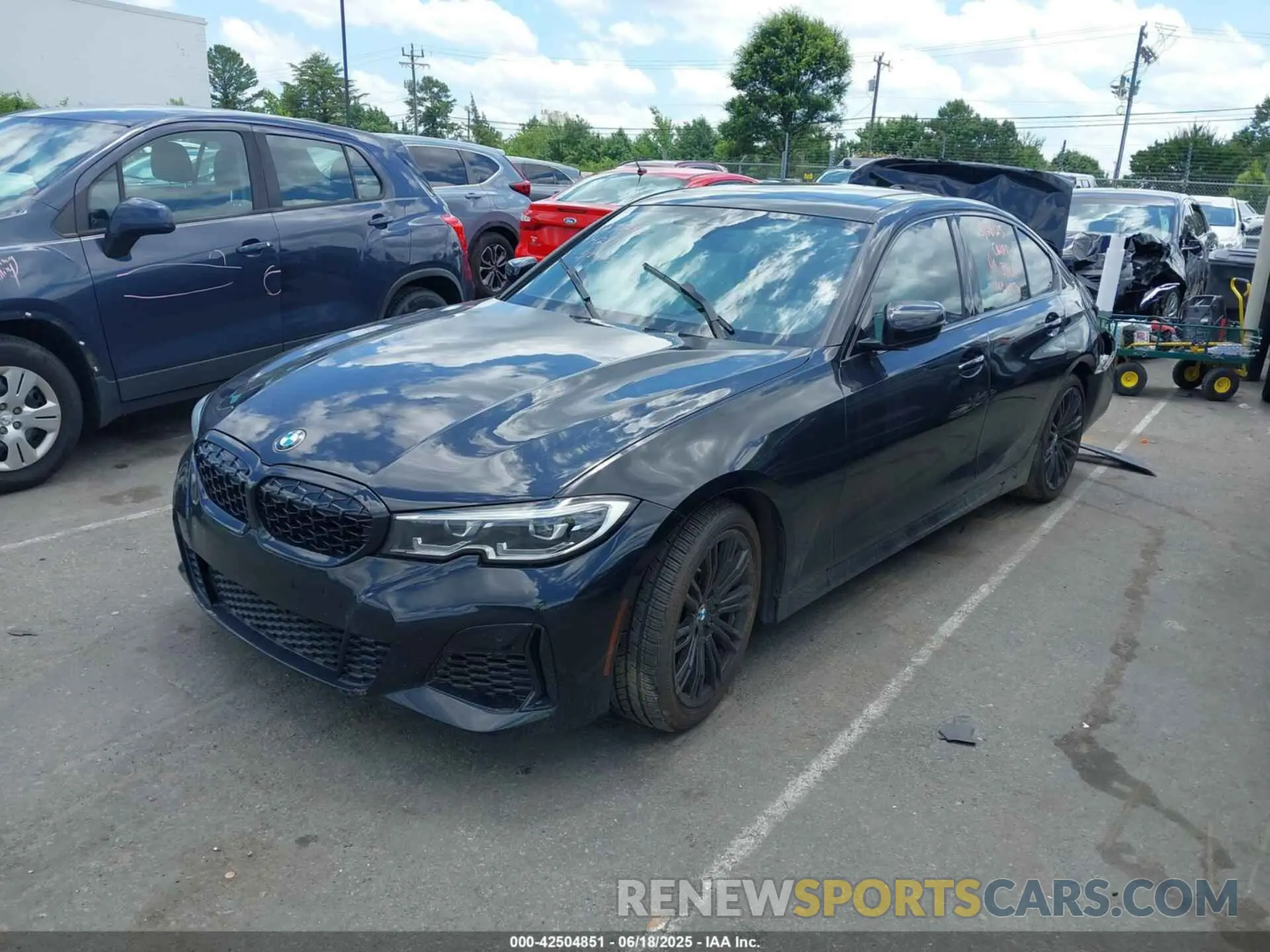 2 fotografías del automóvil dañado WBA5U7C06LFH27191 BMW 3 SERIES 2020