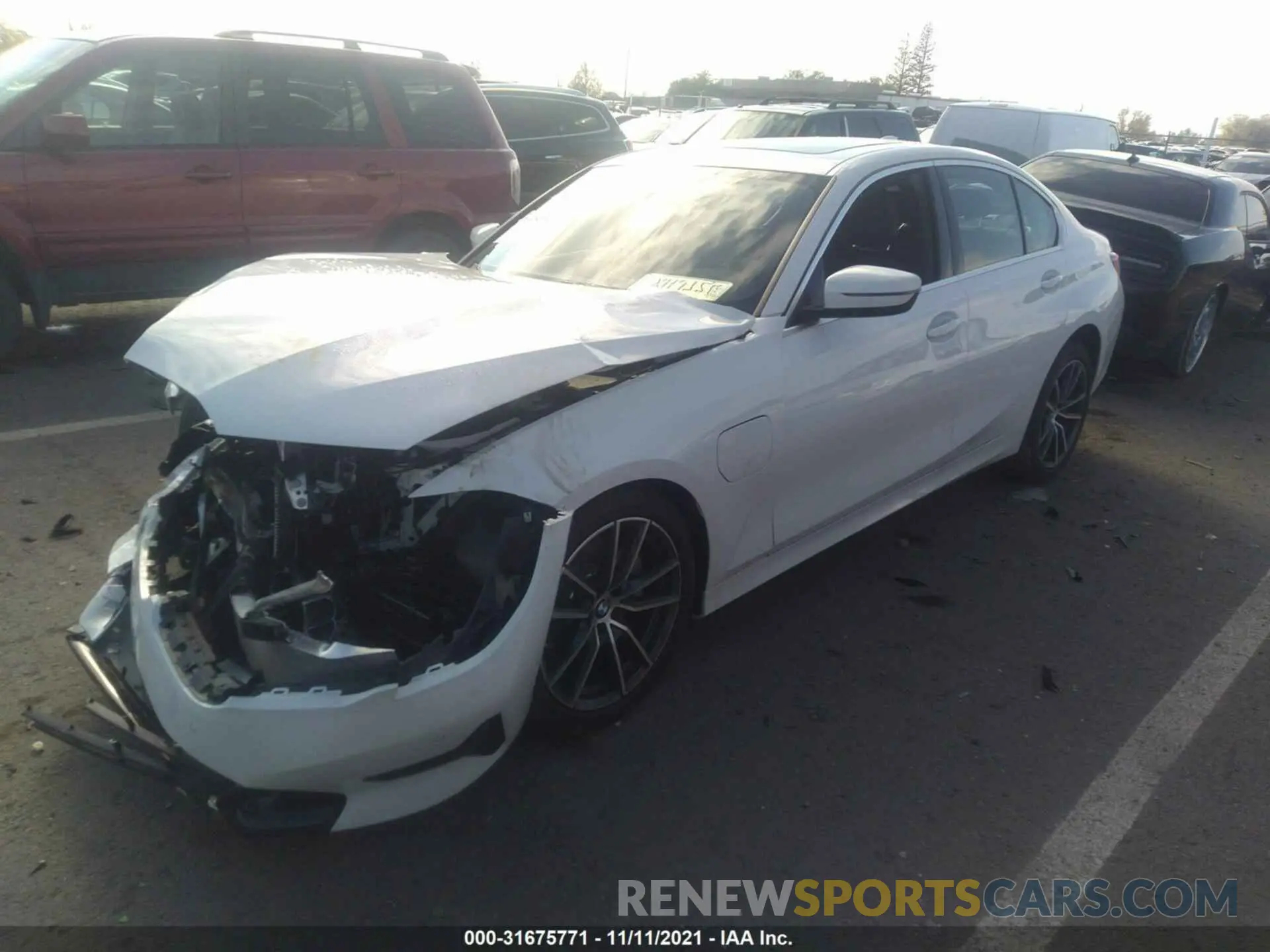 2 fotografías del automóvil dañado 3MW5P7J06M8C11575 BMW 3 SERIES 2021