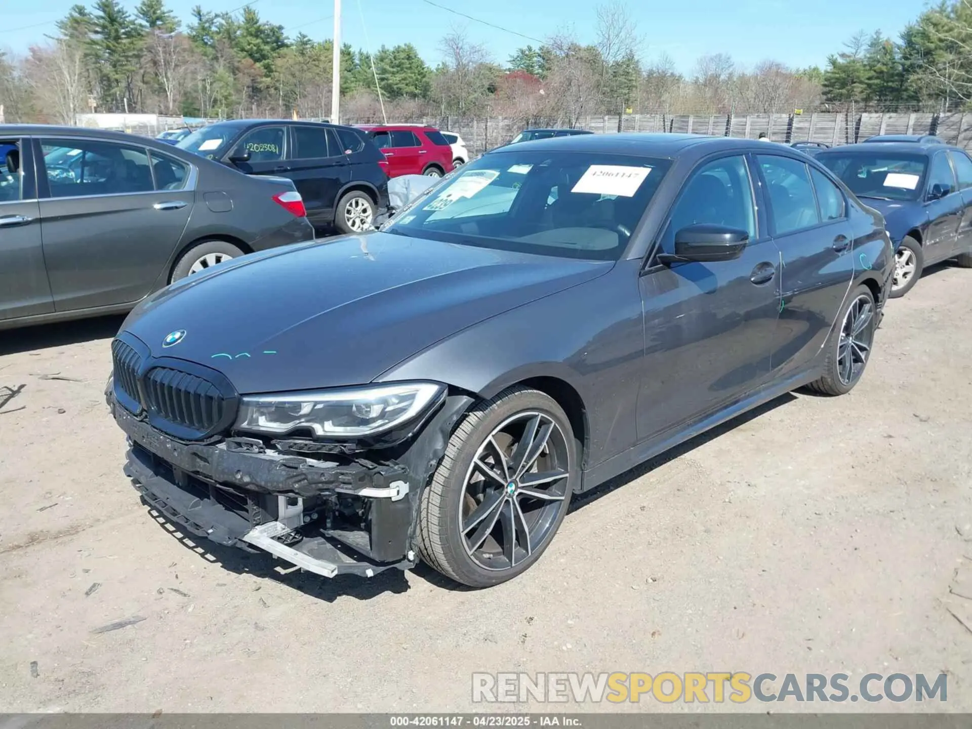 2 fotografías del automóvil dañado 3MW5R7J08M8C03343 BMW 330I 2021