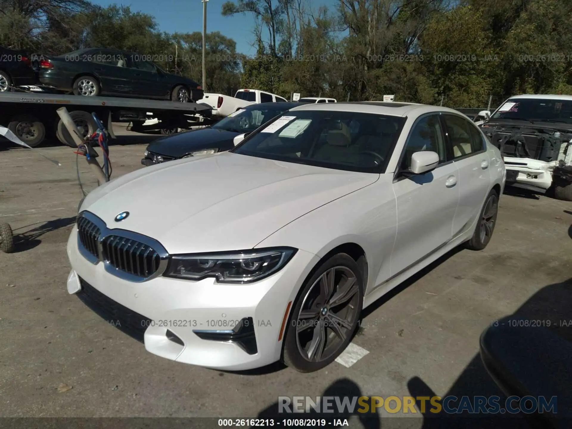 2 fotografías del automóvil dañado WBA5R7C59KAJ84053 BMW 330XI 2019