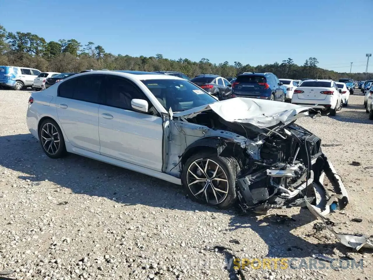 4 fotografías del automóvil dañado WBA53BH00NWX39478 BMW 5 SERIES 2022