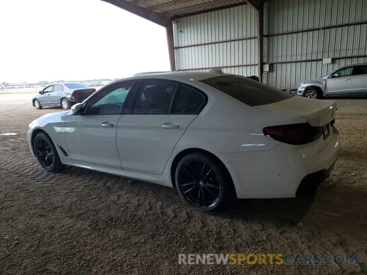 2 fotografías del automóvil dañado WBA53BJ05NWX79517 BMW 5 SERIES 2022