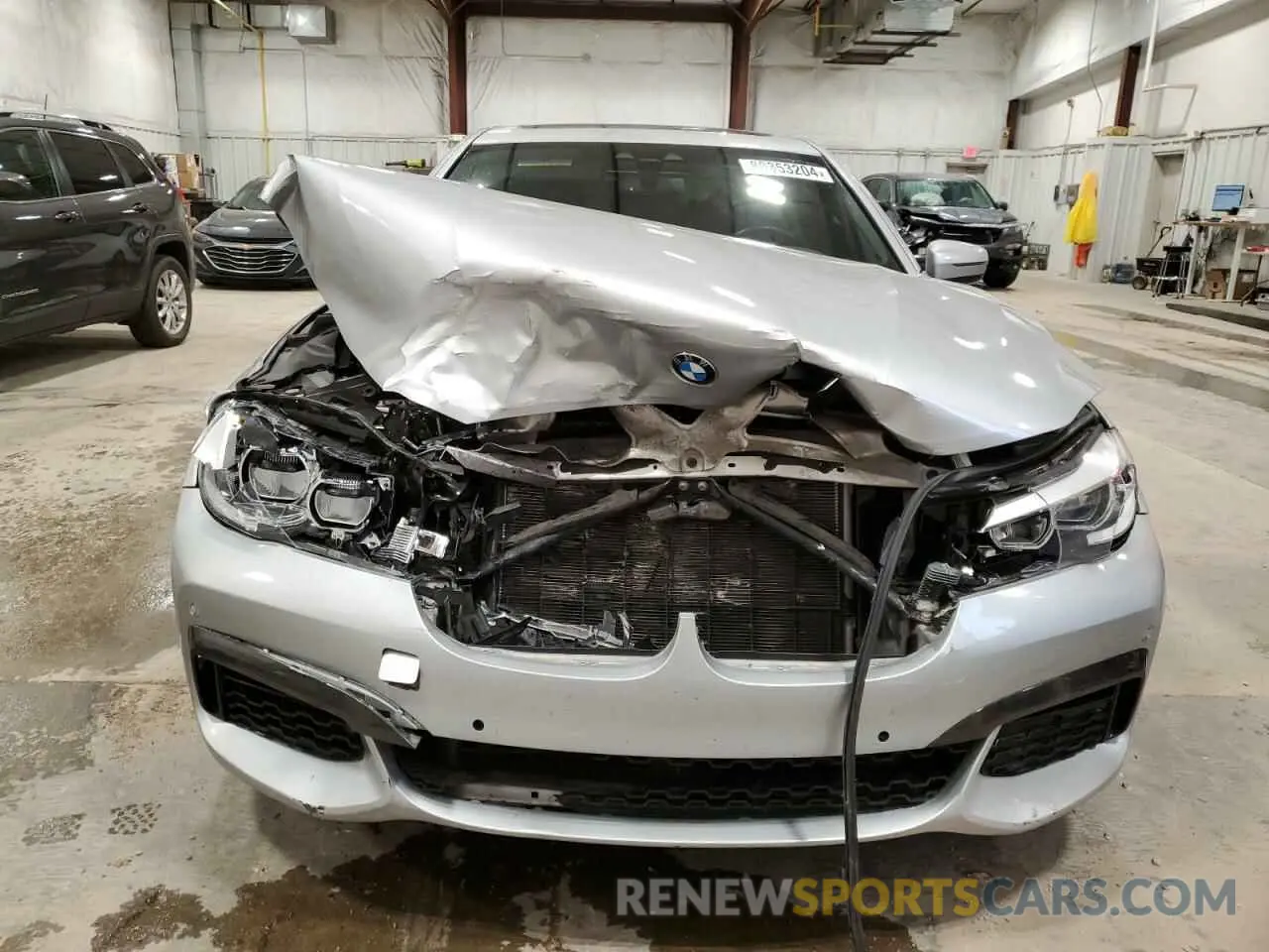 5 fotografías del automóvil dañado WBA7E2C51KB218343 BMW 7 SERIES 2019