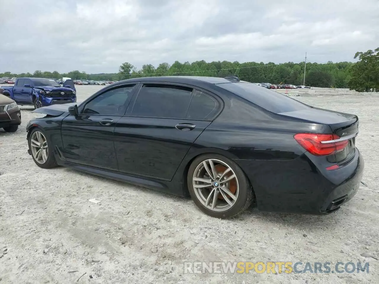 2 fotografías del automóvil dañado WBA7E4C51KGV28443 BMW 7 SERIES 2019