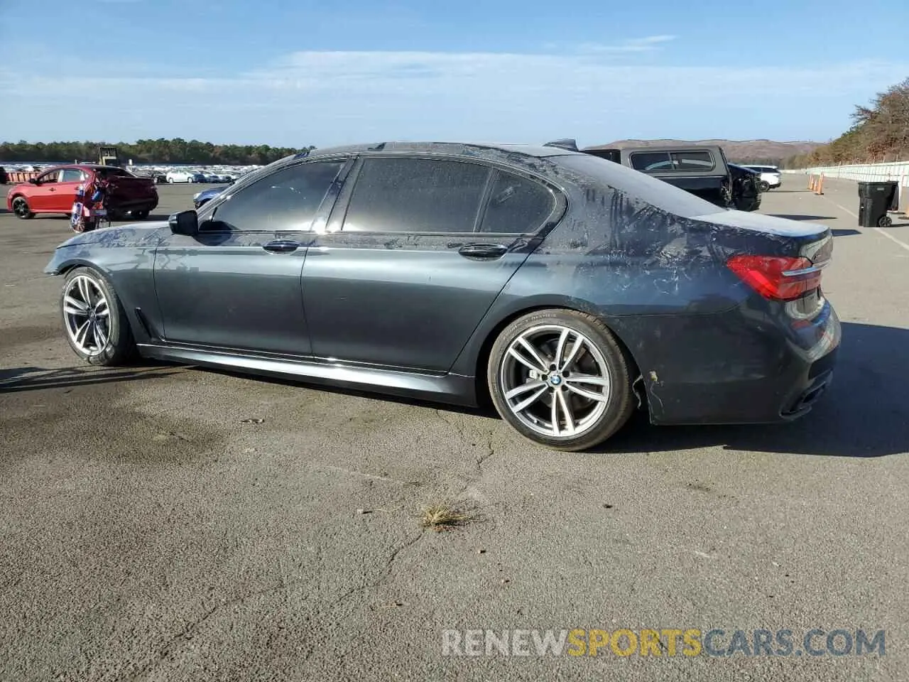 2 fotografías del automóvil dañado WBA7E4C56KGV70297 BMW 7 SERIES 2019