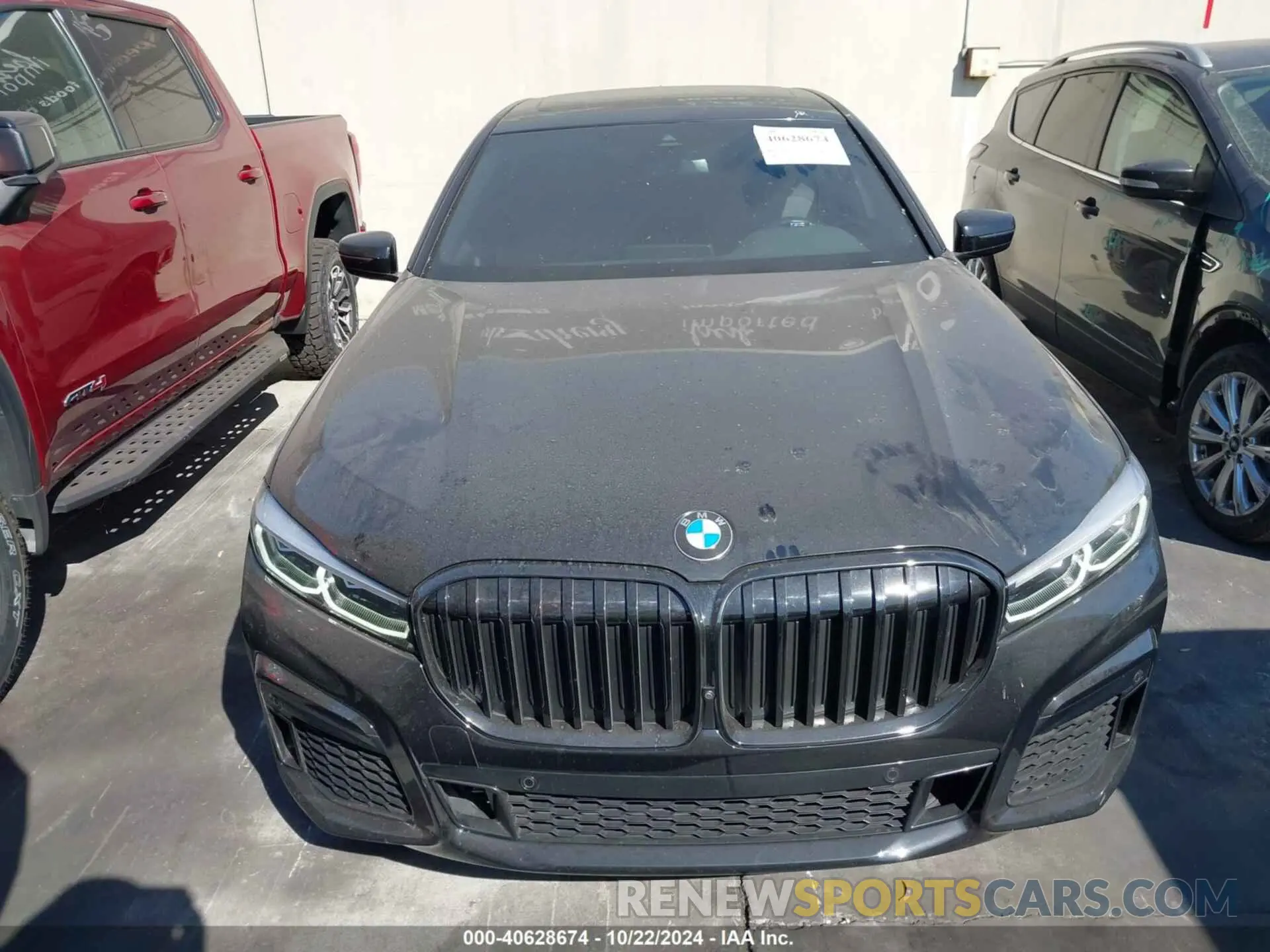 12 fotografías del automóvil dañado WBA7T2C08NCJ48283 BMW 740 2022