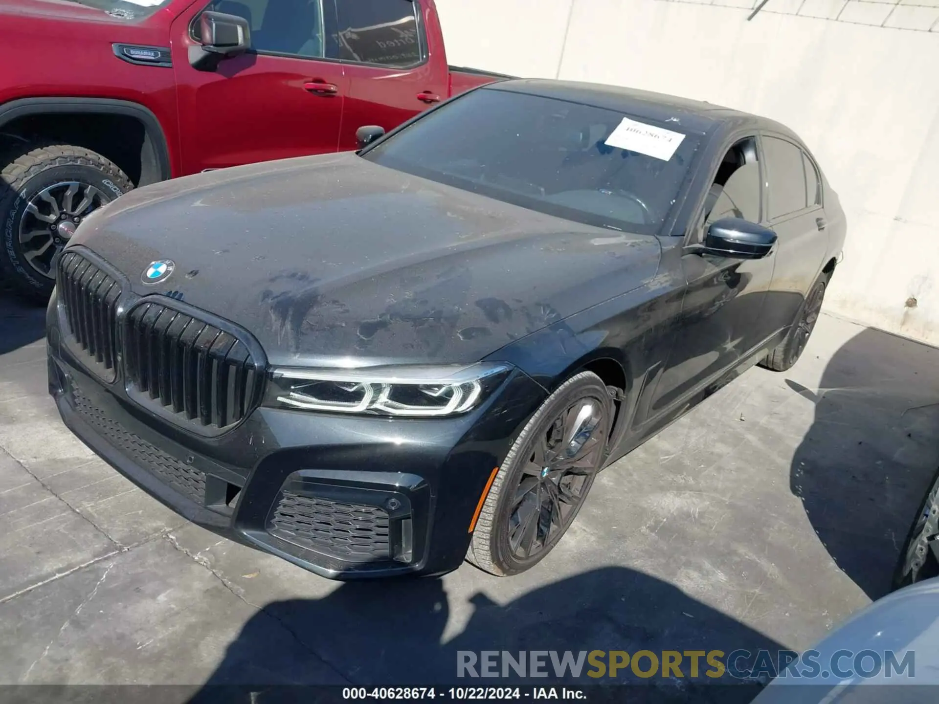 2 fotografías del automóvil dañado WBA7T2C08NCJ48283 BMW 740 2022