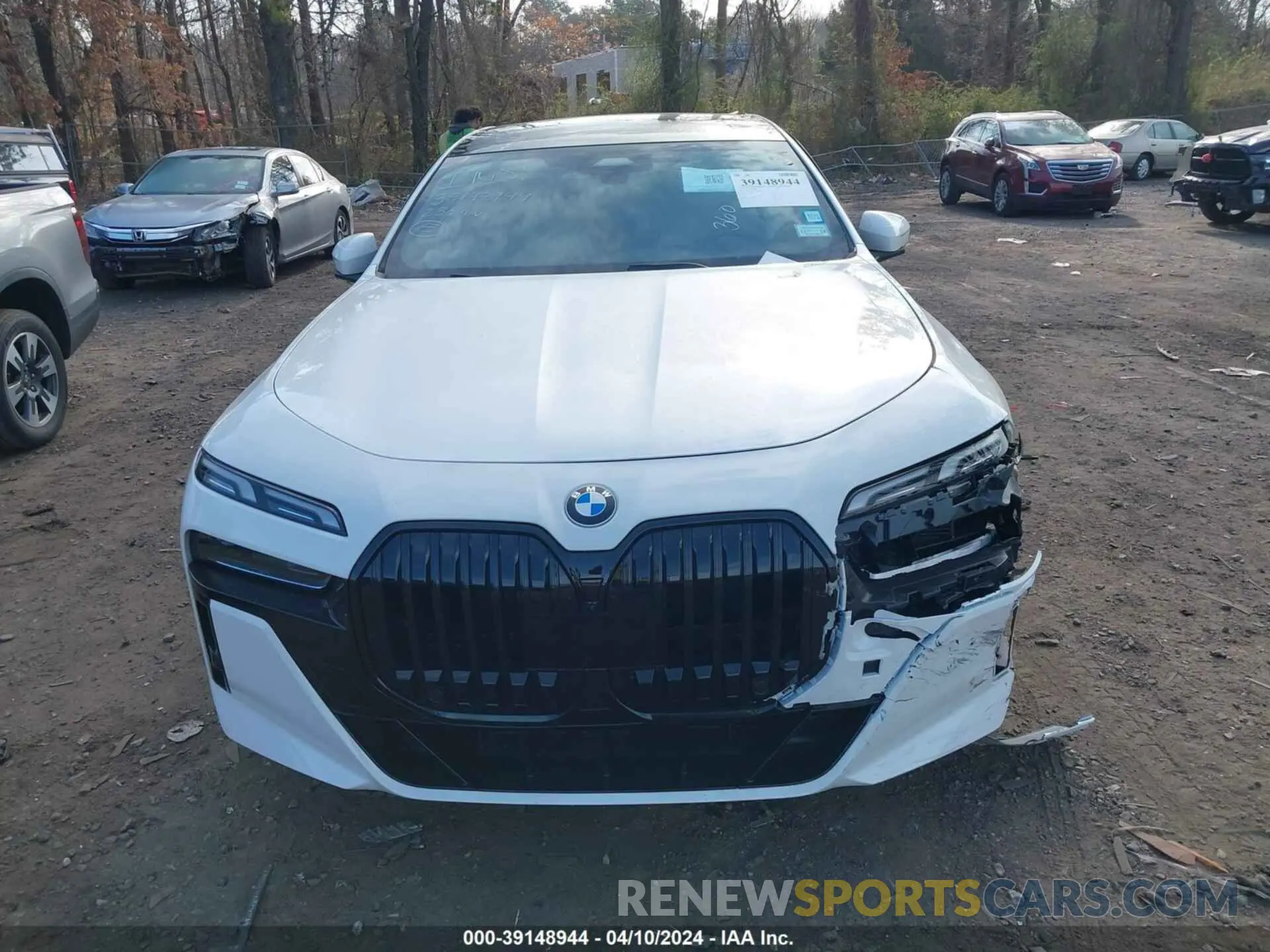 12 fotografías del automóvil dañado WBA23EH01PCL92686 BMW 740 2023