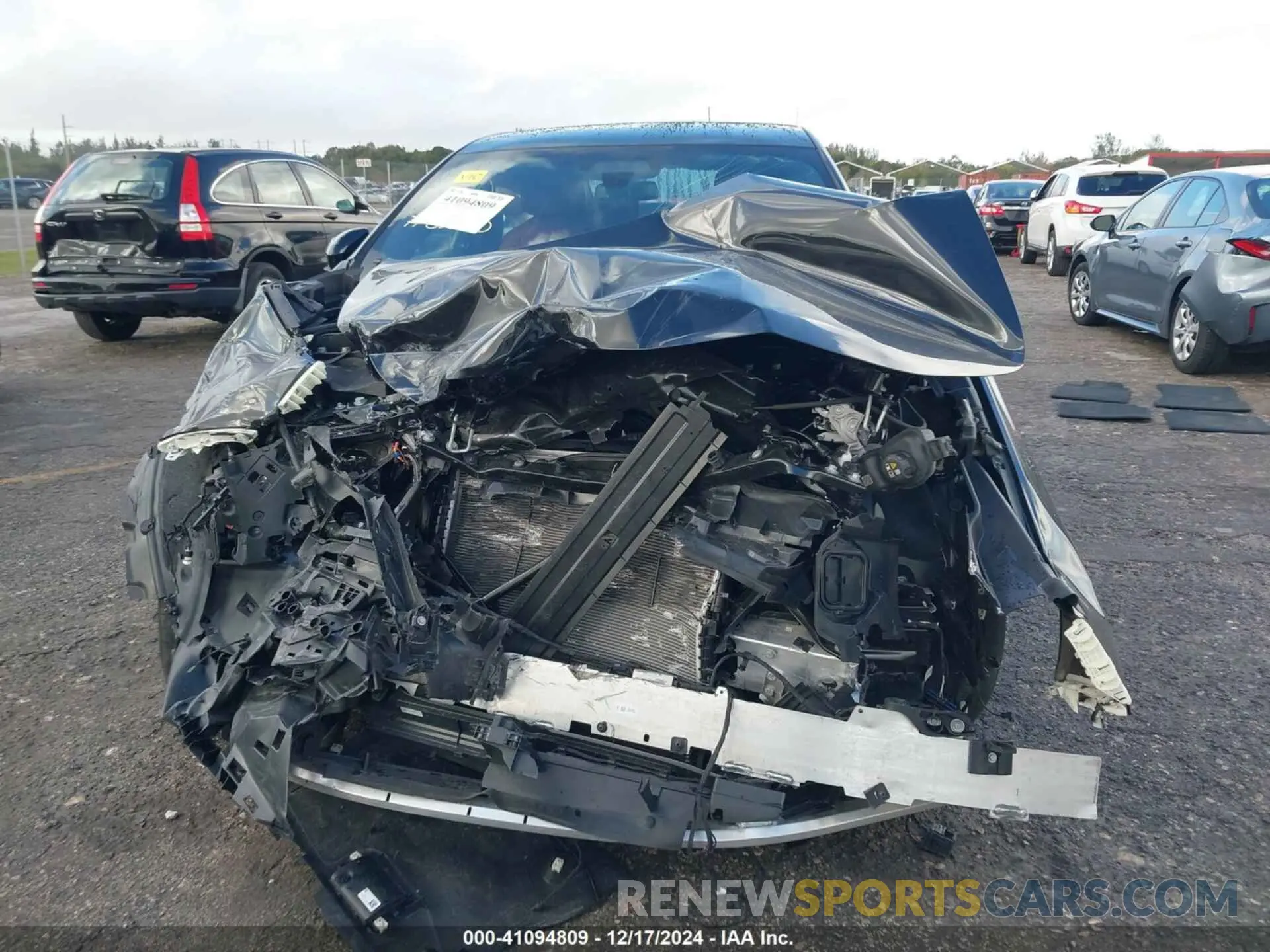 12 fotografías del automóvil dañado WBA23EH01RCR40270 BMW 740 2024