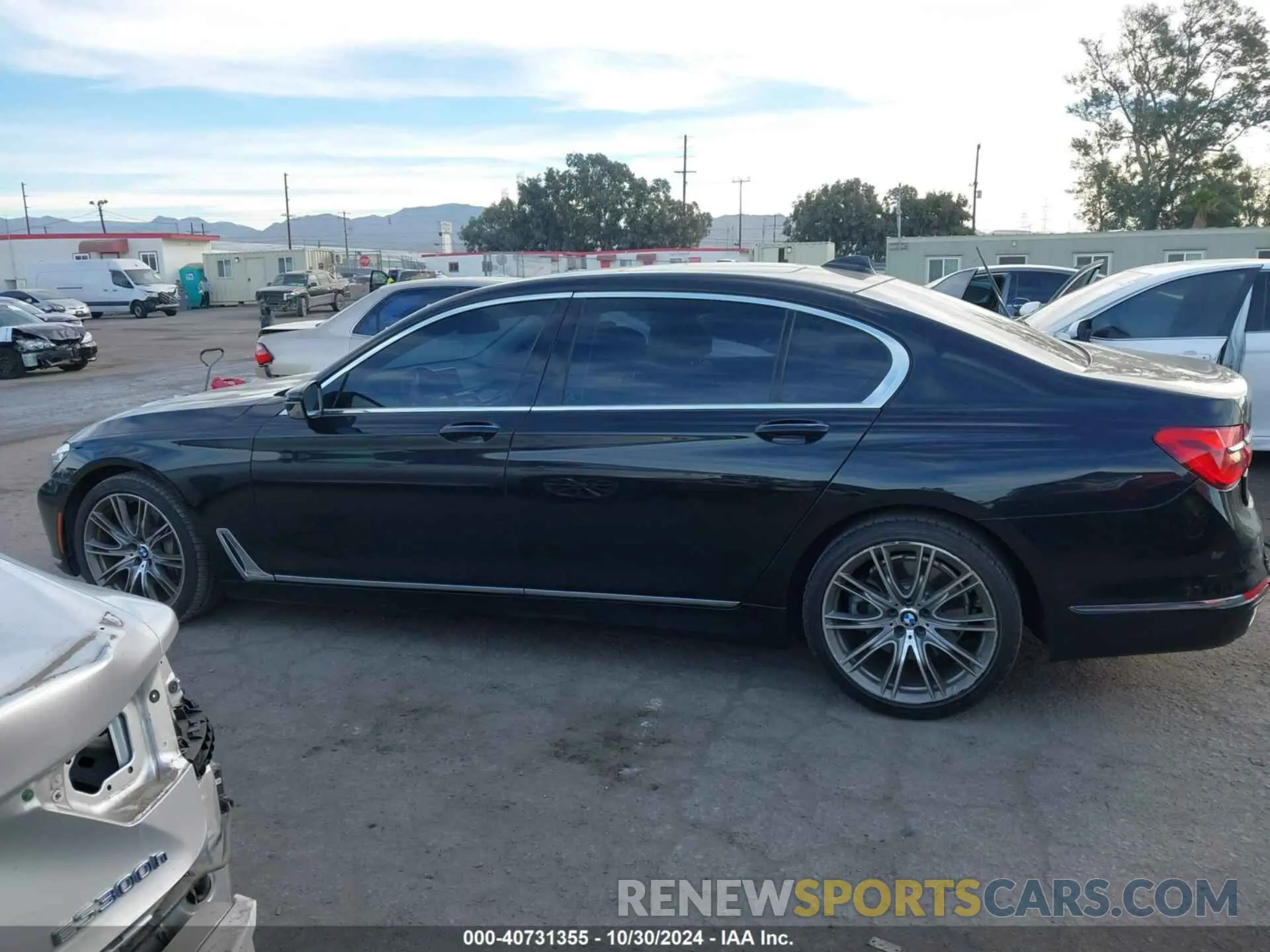 14 fotografías del automóvil dañado WBA7E2C56KB217625 BMW 740I 2019