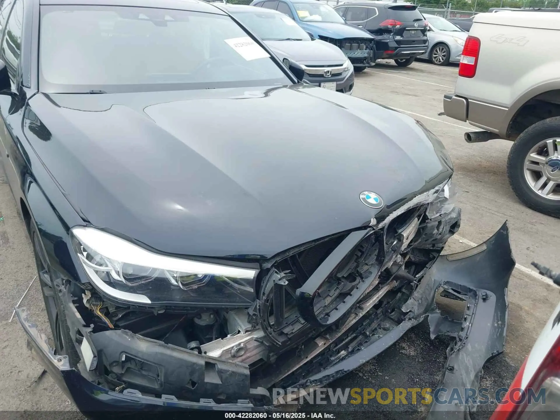 10 fotografías del automóvil dañado WBA7E4C54KGV28663 BMW 740I 2019