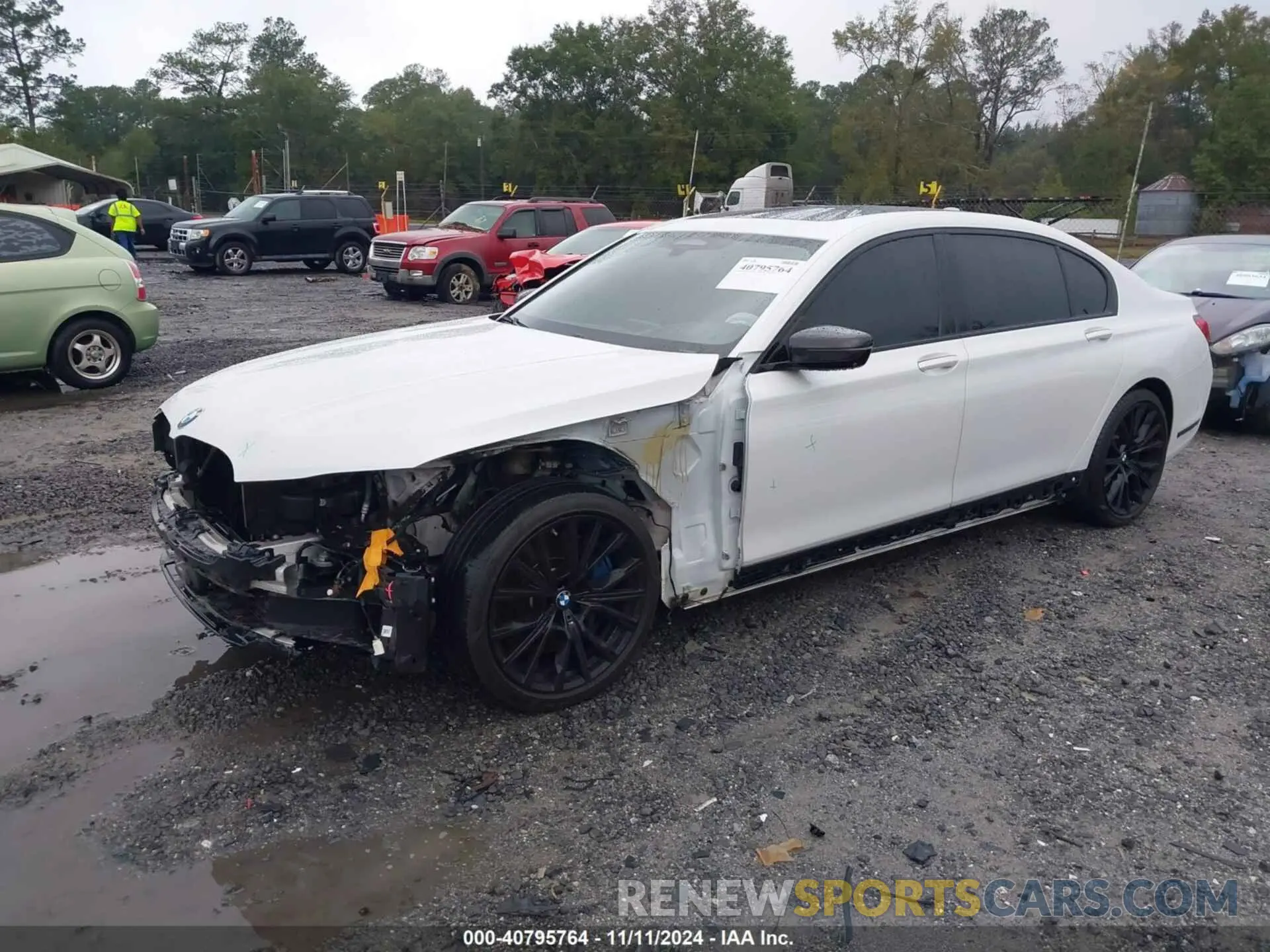 2 fotografías del automóvil dañado WBA7U2C09LGM27356 BMW 750I 2020