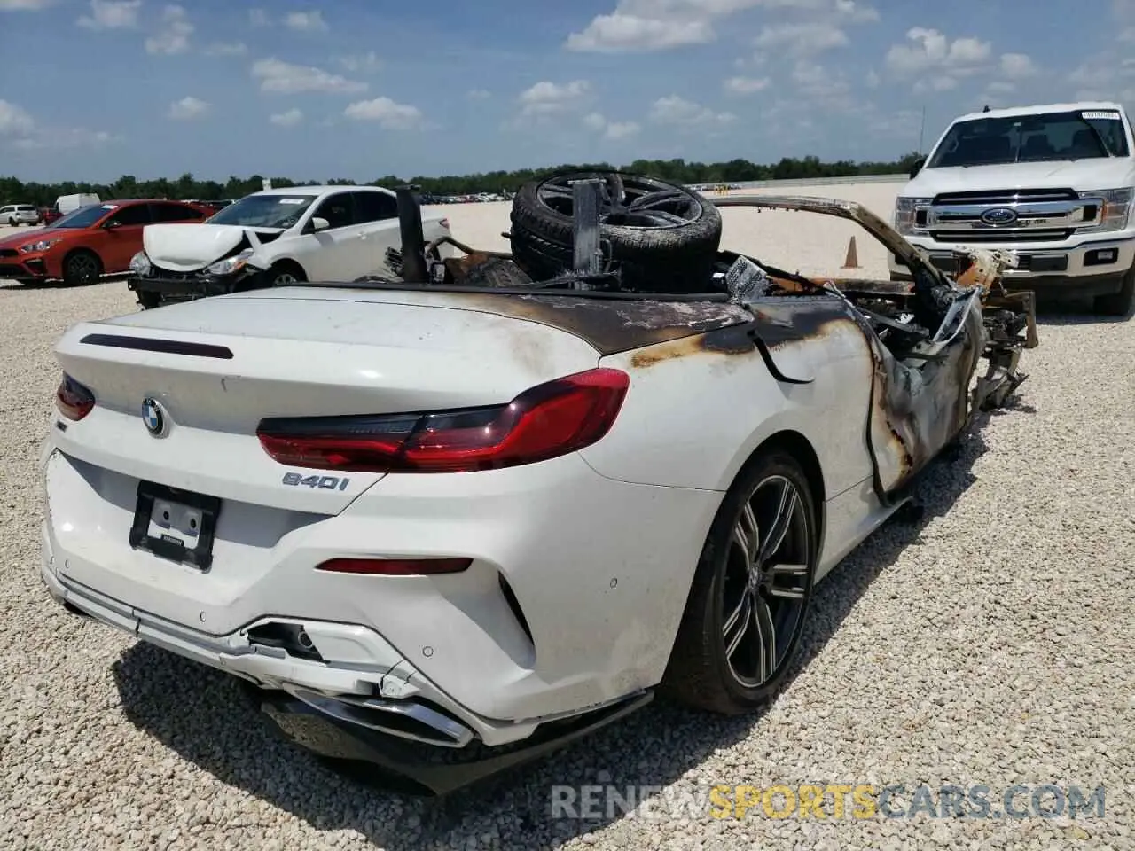 4 fotografías del automóvil dañado WBADZ4C05MCG10975 BMW 8 SERIES 2021