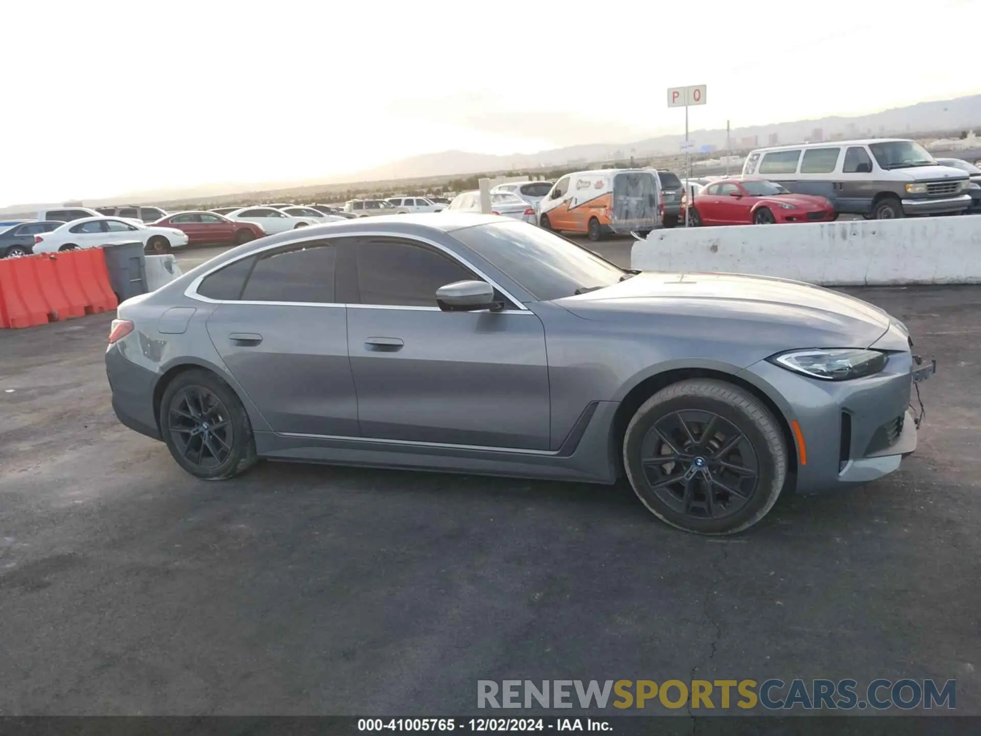 12 fotografías del automóvil dañado WBY73AW06NFN11783 BMW I4 2022