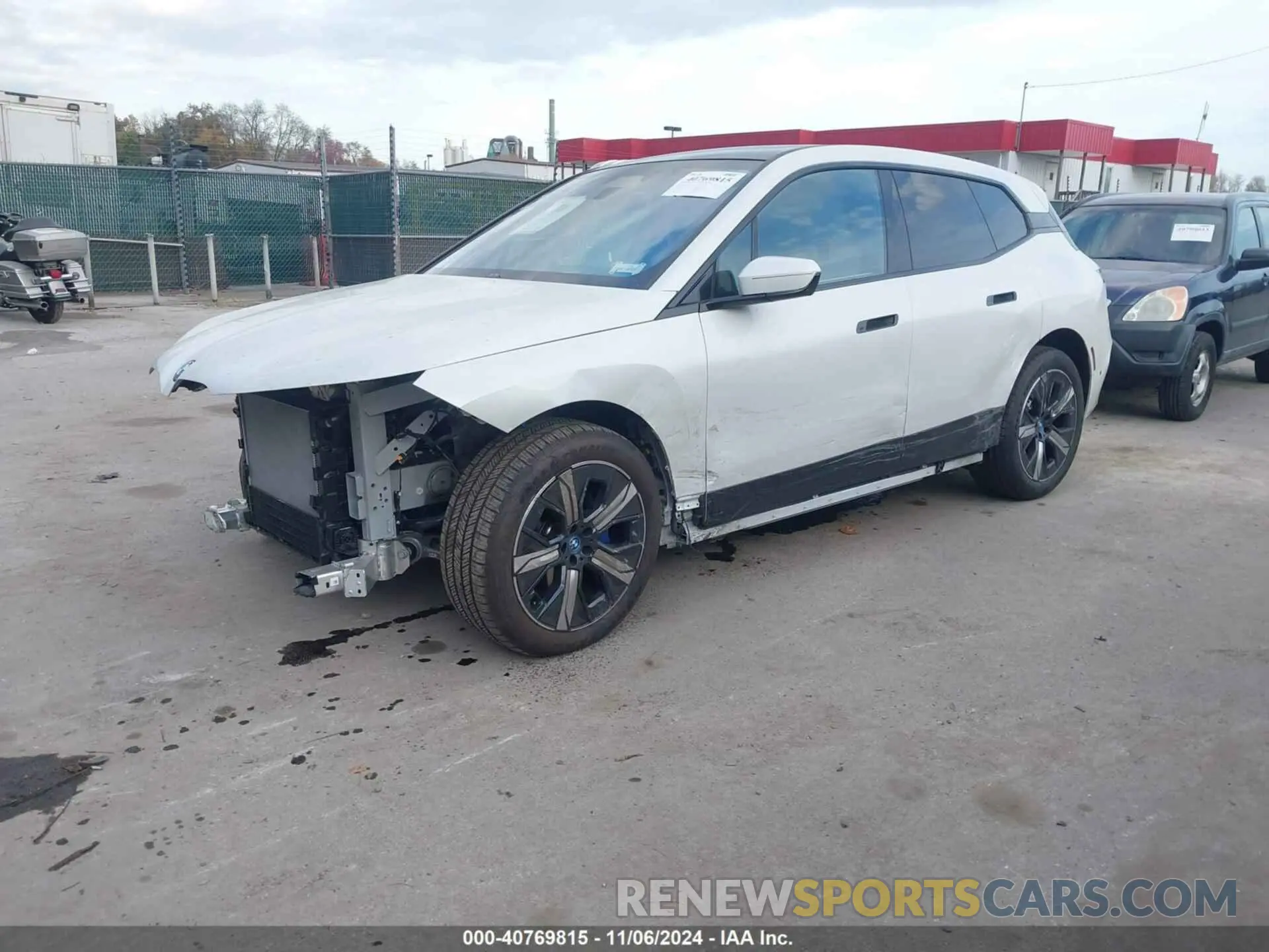 2 fotografías del automóvil dañado WB523CF06RCR10655 BMW IX 2024