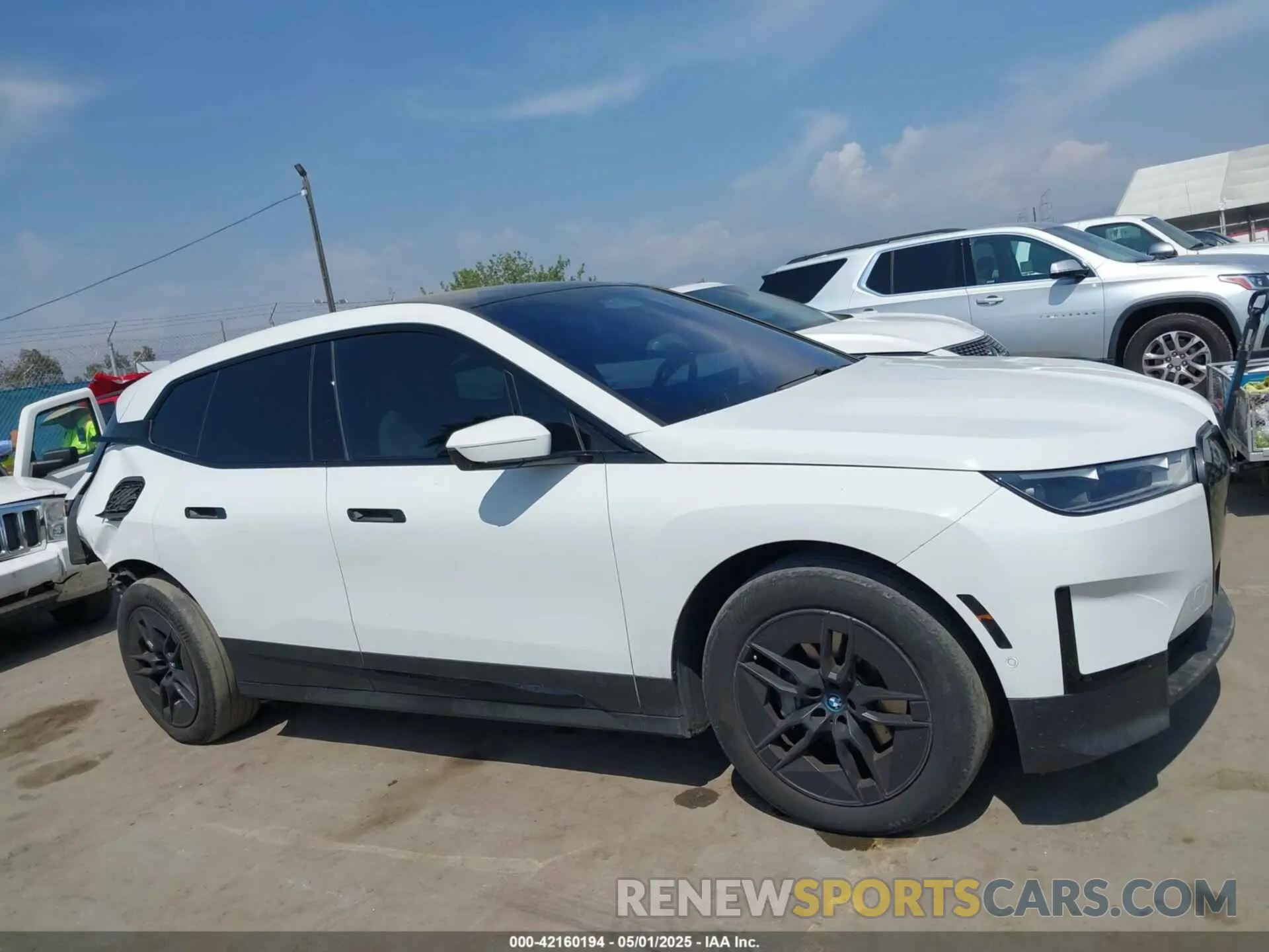 14 fotografías del automóvil dañado WB523CF07RCN60873 BMW IX 2024