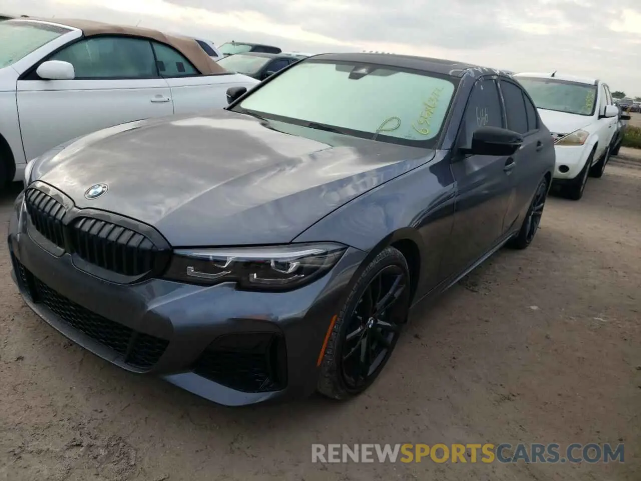 2 fotografías del automóvil dañado 3MW5U7J0XN8C30527 BMW M3 2022