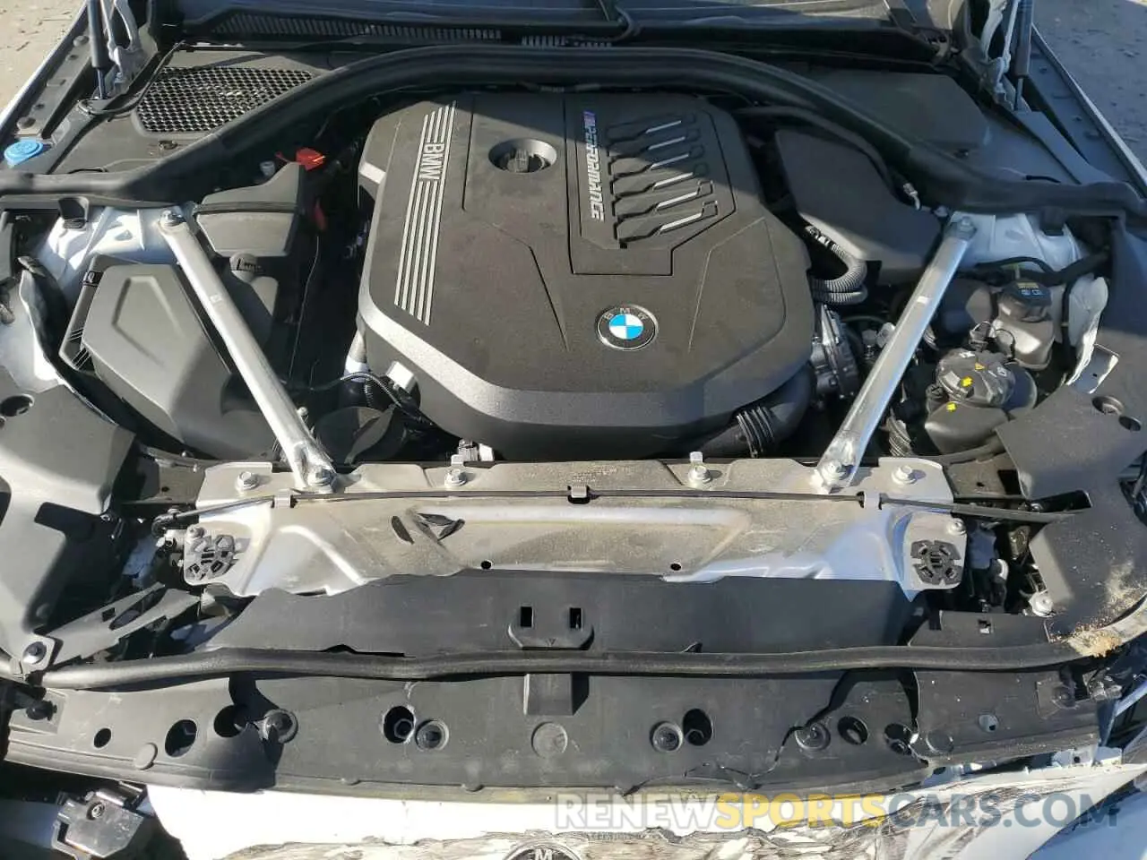 12 fotografías del automóvil dañado WBA53AT02MCH55279 BMW M4 2021