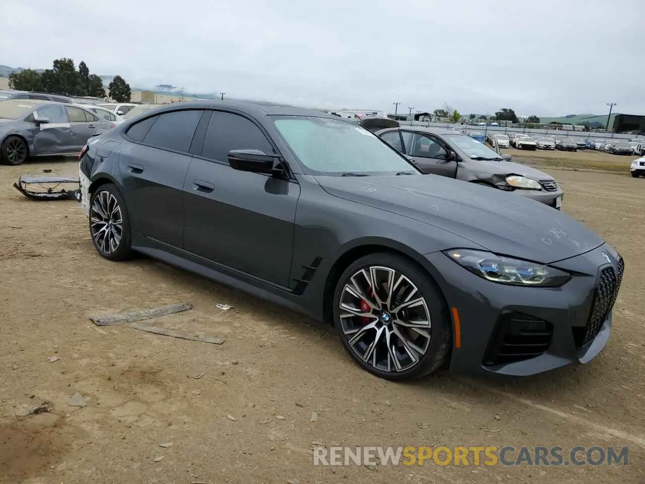 4 fotografías del automóvil dañado WBA13AW04NFM02565 BMW M440XI GRA 2022