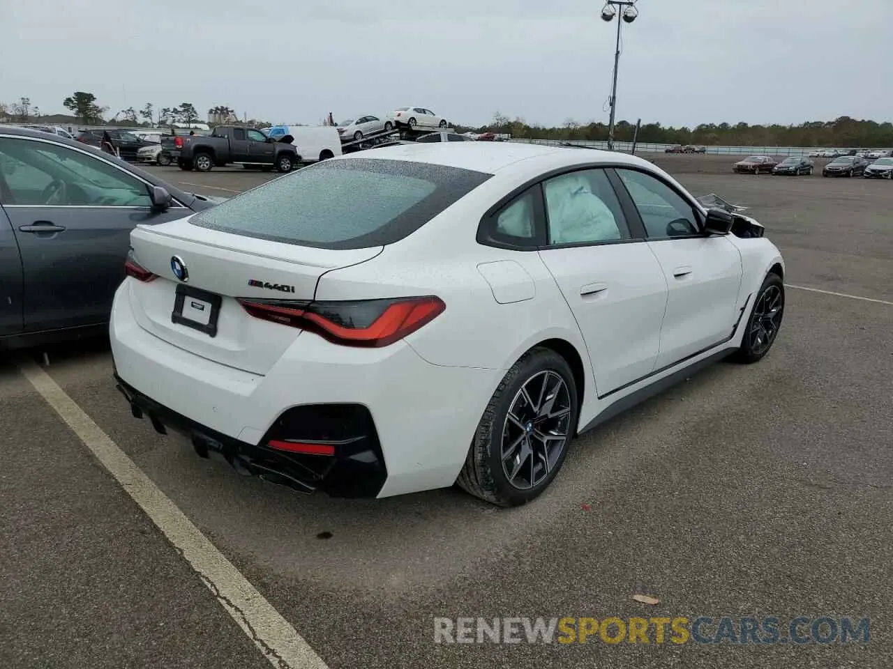 4 fotografías del automóvil dañado WBA13AW07NFM49203 BMW M440XI GRA 2022