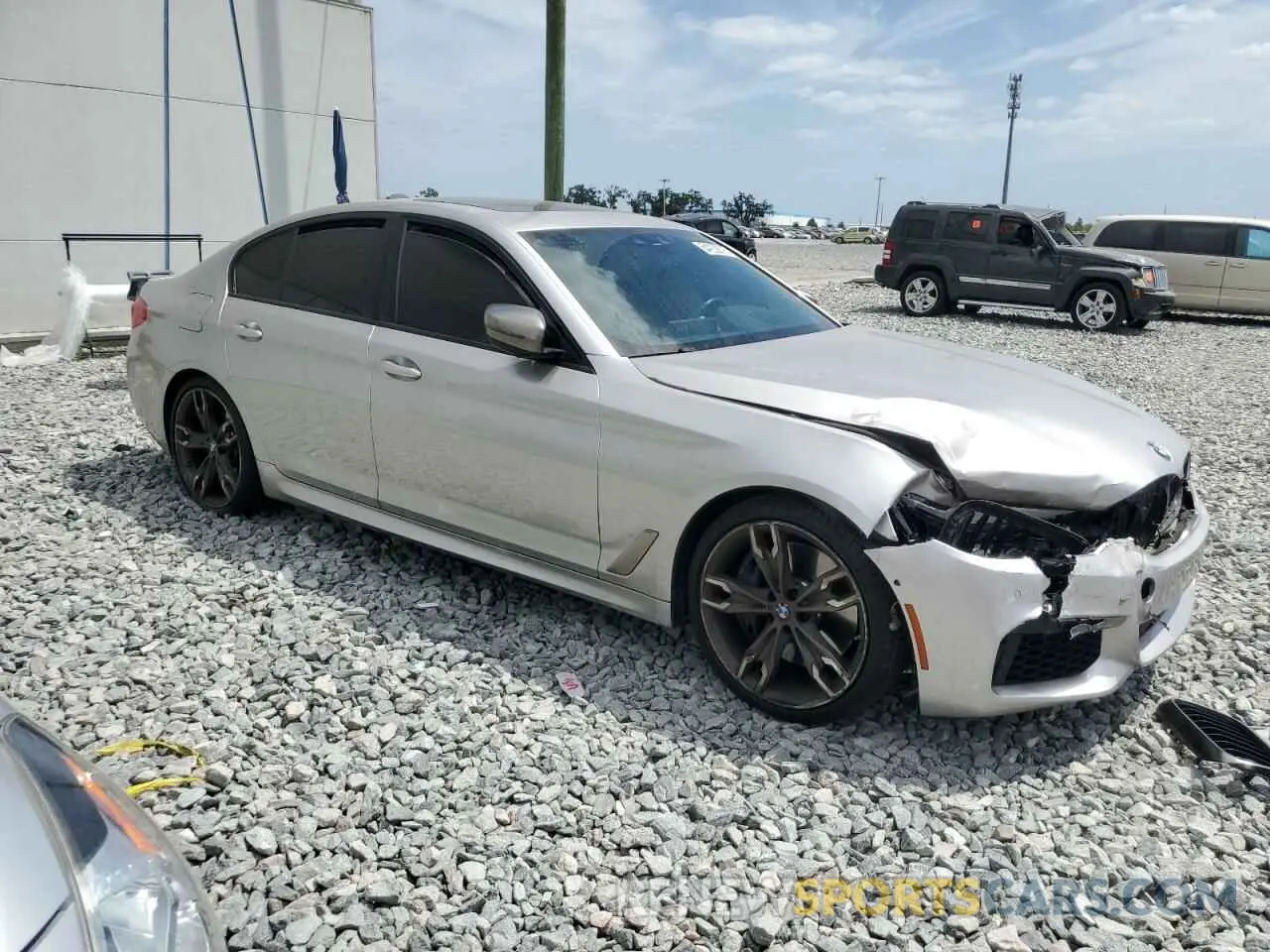 4 fotografías del automóvil dañado WBAJB9C53KB464902 BMW M5 2019