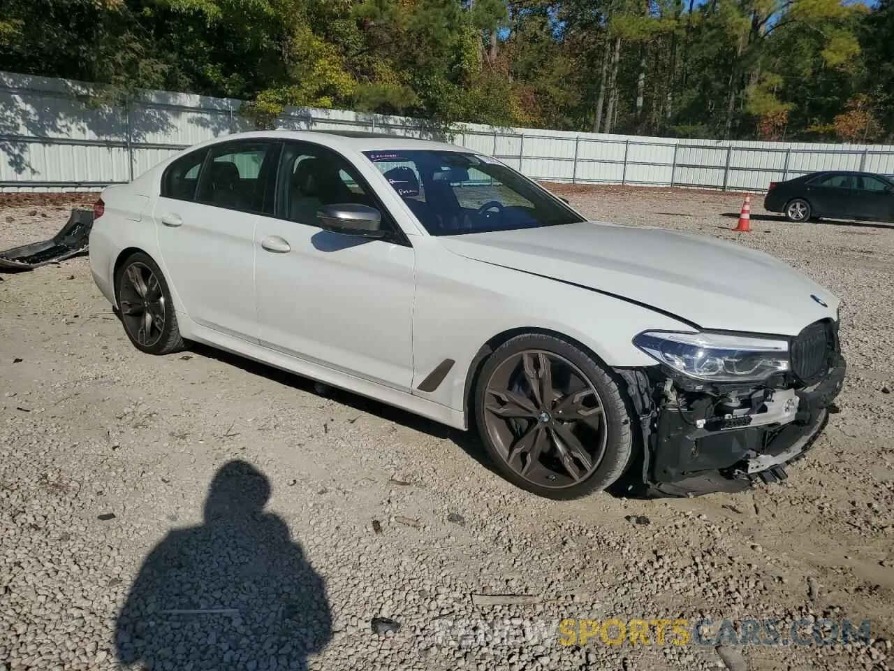 4 fotografías del automóvil dañado WBAJB9C57KB288727 BMW M5 2019
