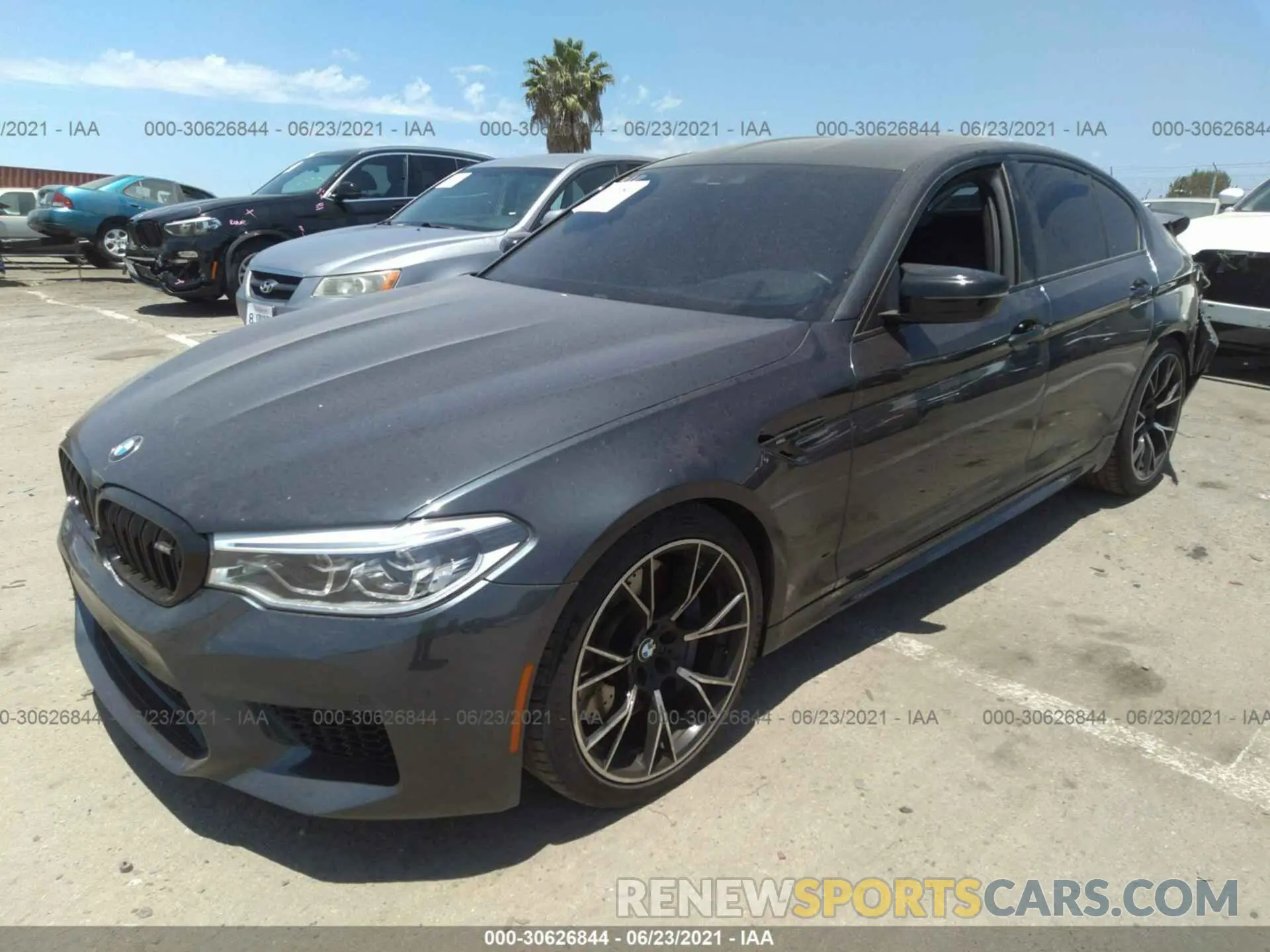 2 fotografías del automóvil dañado WBSJF0C5XKB446621 BMW M5 2019