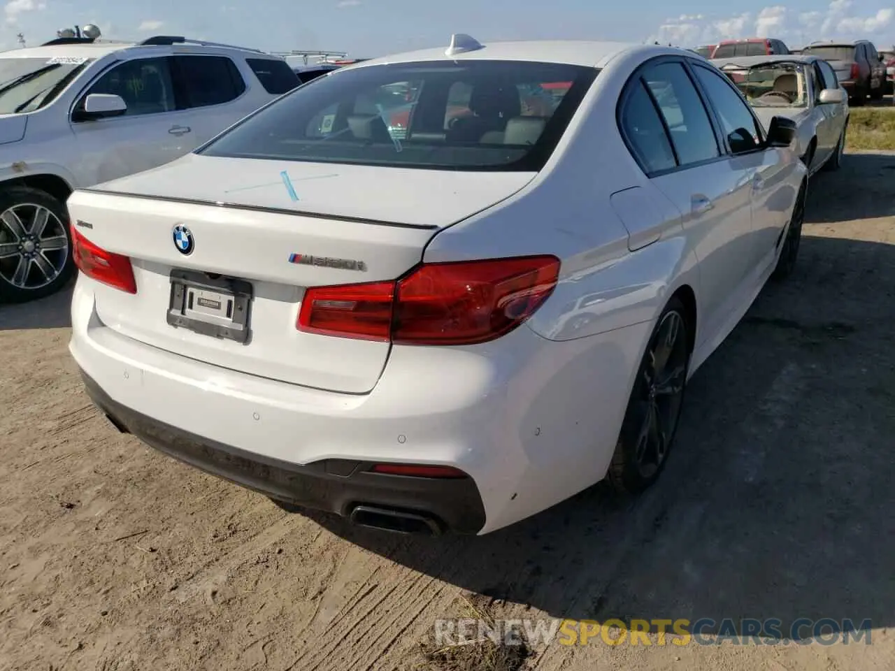 4 fotografías del automóvil dañado WBAJS7C00LBN96347 BMW M5 2020