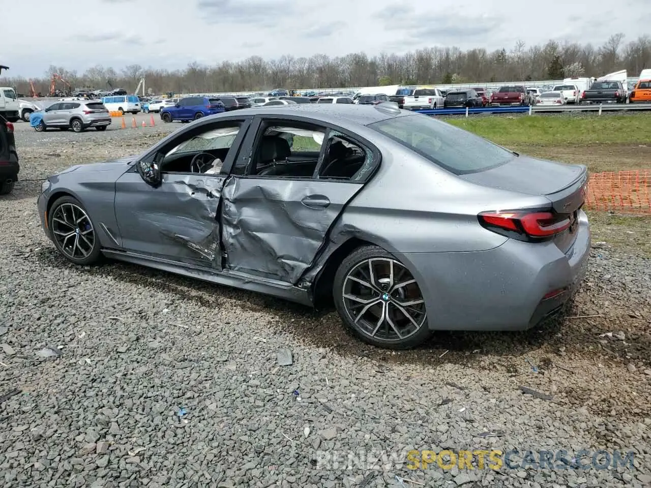 2 fotografías del automóvil dañado WBA13BK0XPCL37043 BMW M5 2023