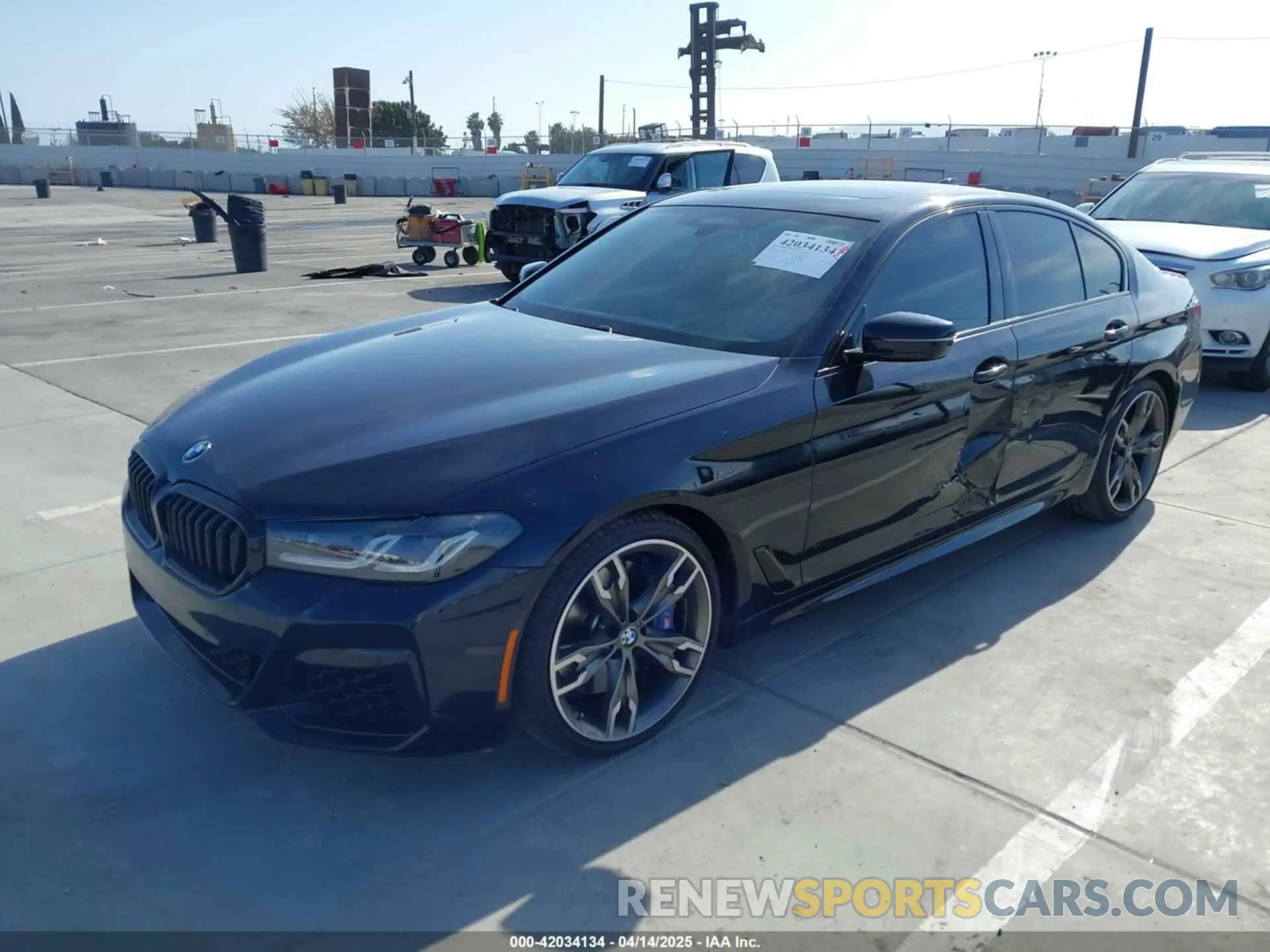 2 fotografías del automóvil dañado WBA13BK06NCJ43672 BMW M550 2022