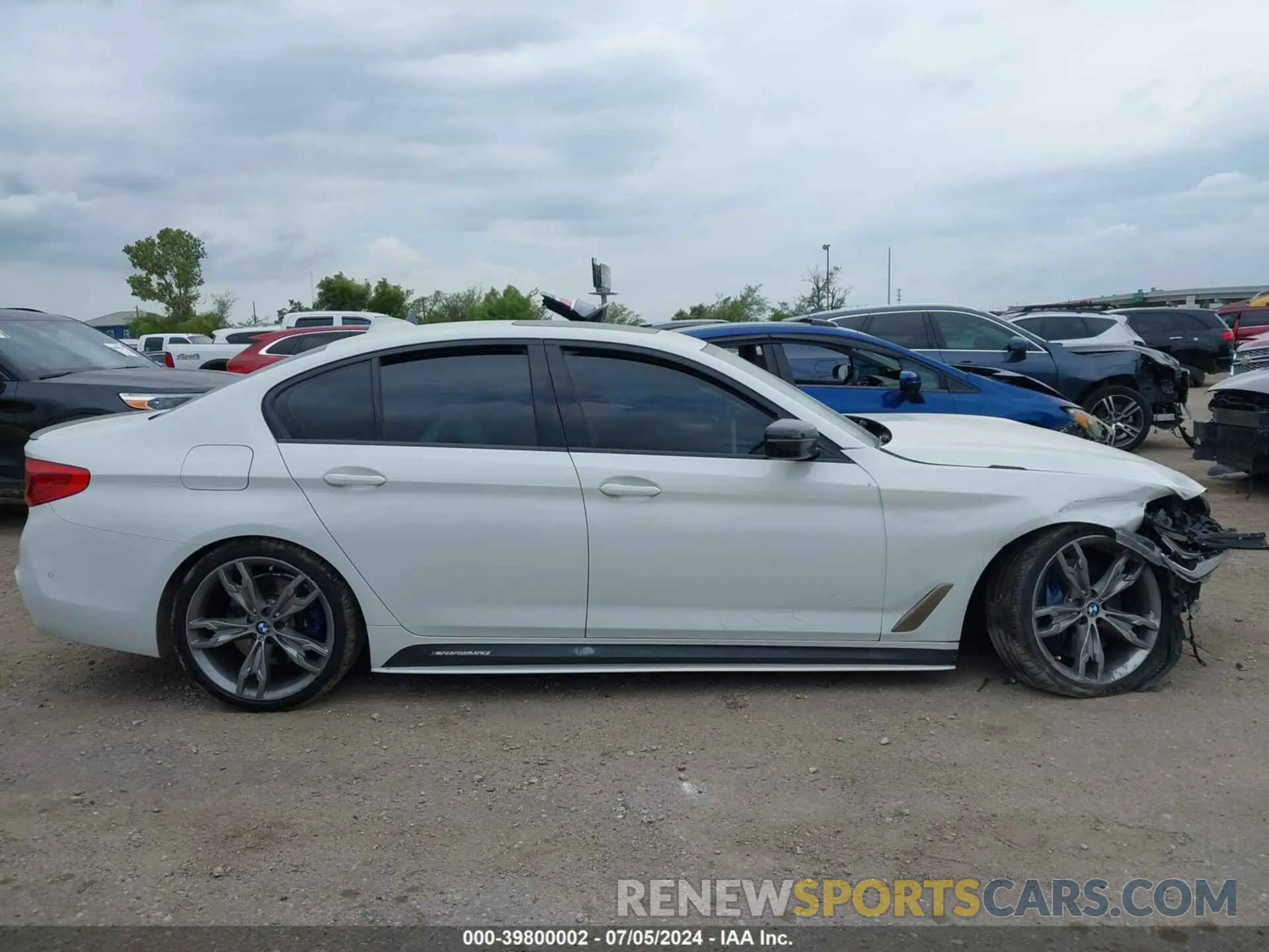 14 fotografías del automóvil dañado WBAJB9C56KB464148 BMW M550I 2019