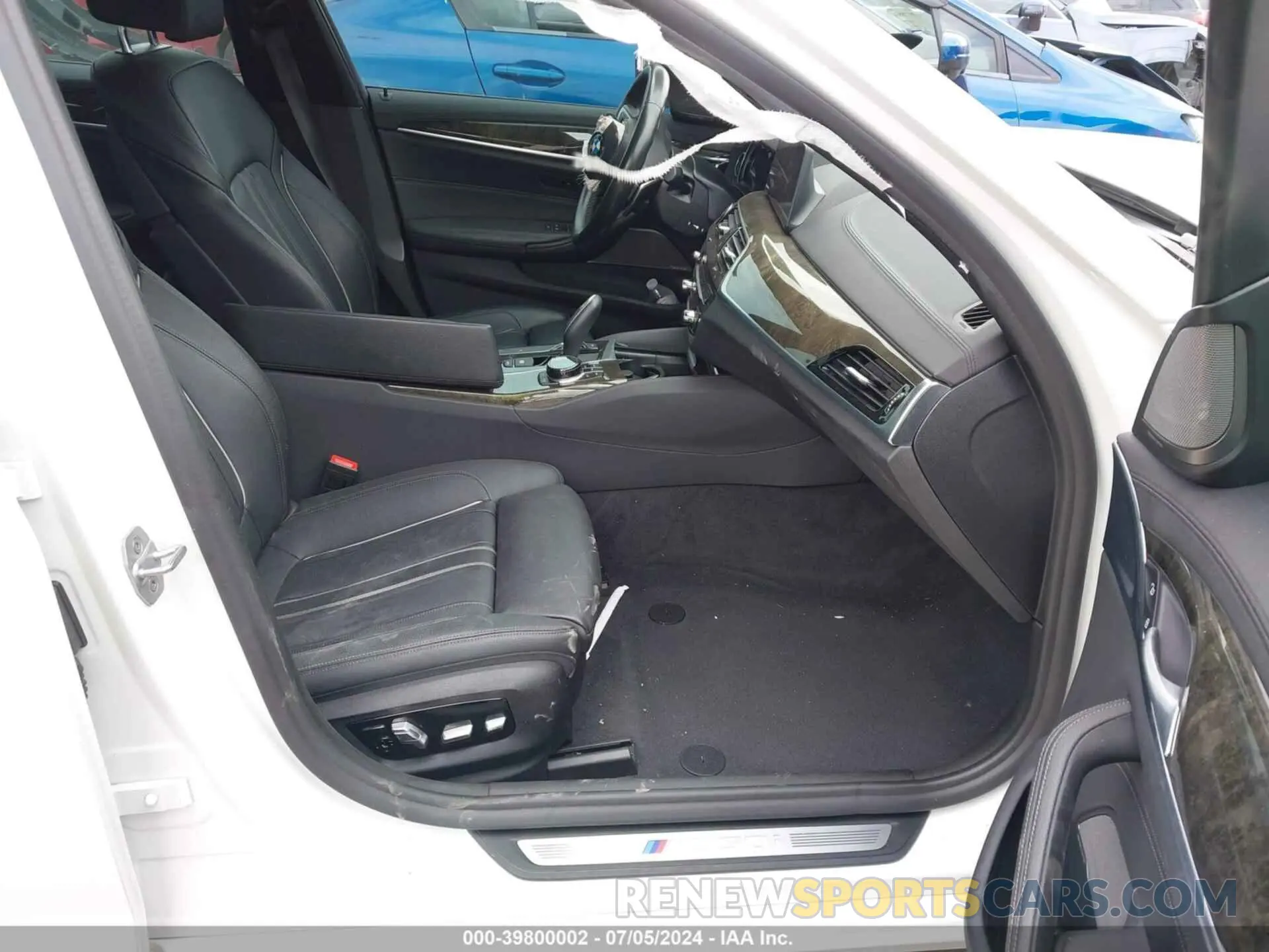 5 fotografías del automóvil dañado WBAJB9C56KB464148 BMW M550I 2019