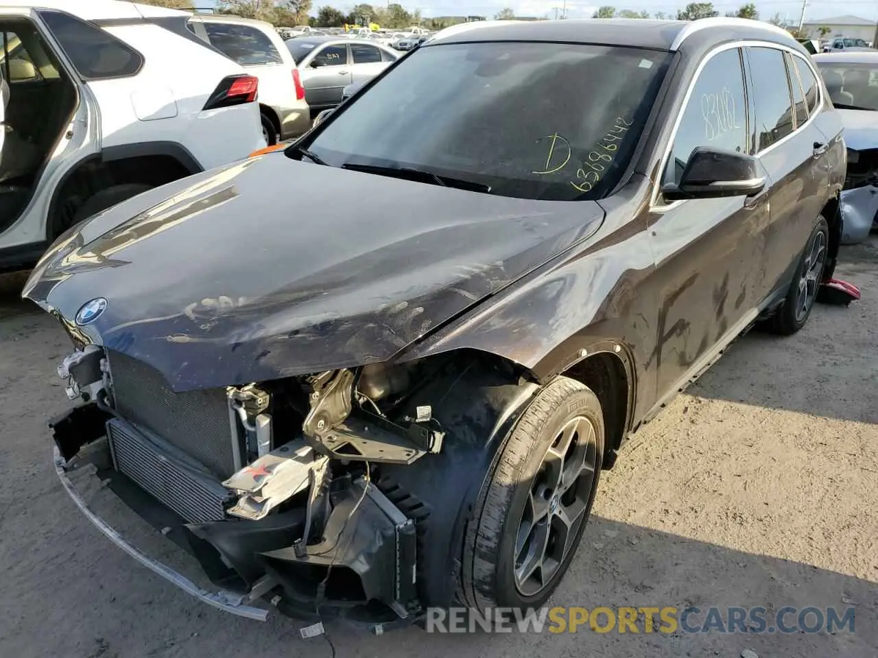 2 fotografías del automóvil dañado WBXHU7C53K3H44786 BMW X1 2019