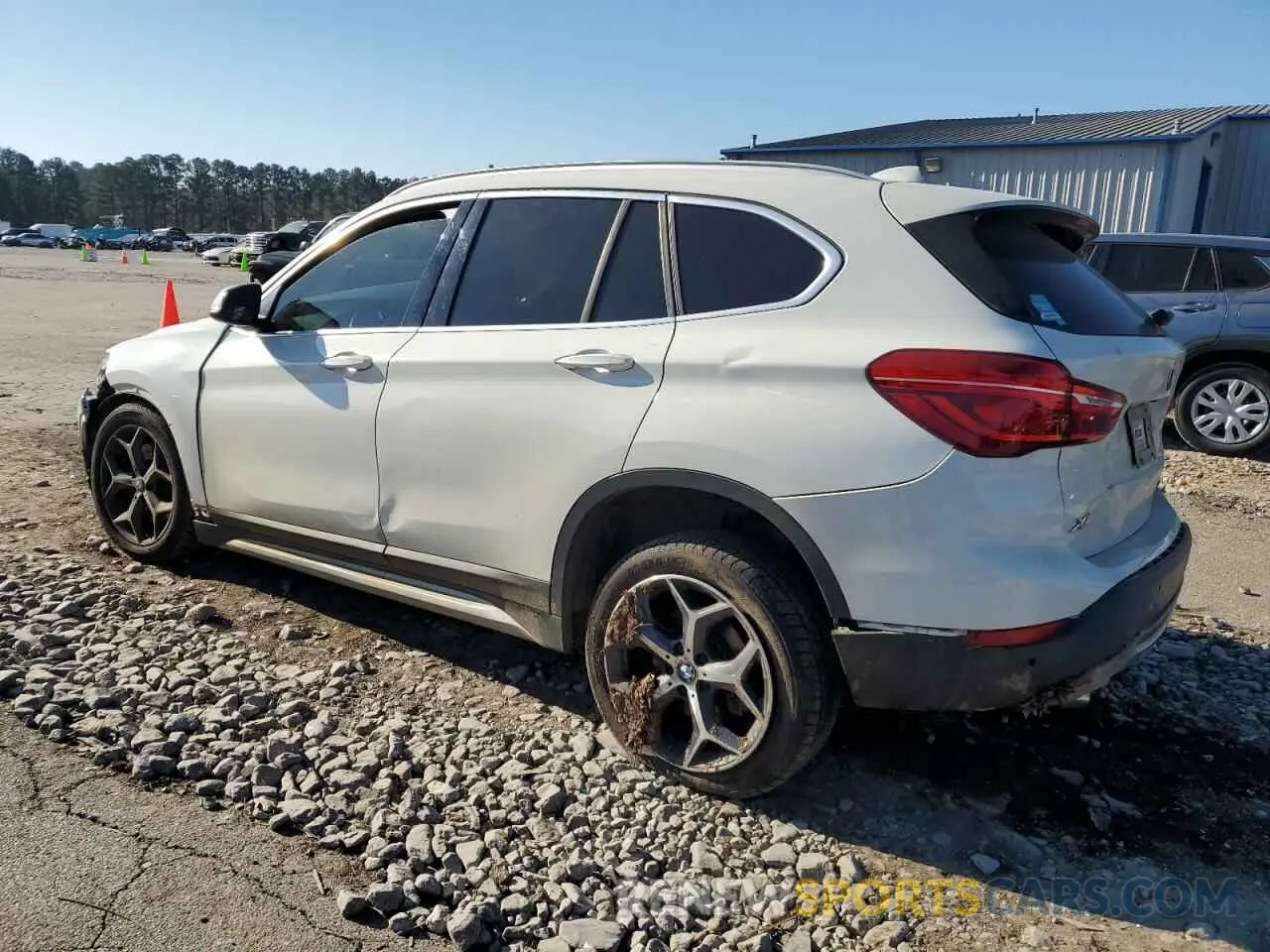 2 fotografías del automóvil dañado WBXHU7C53K3H45694 BMW X1 2019