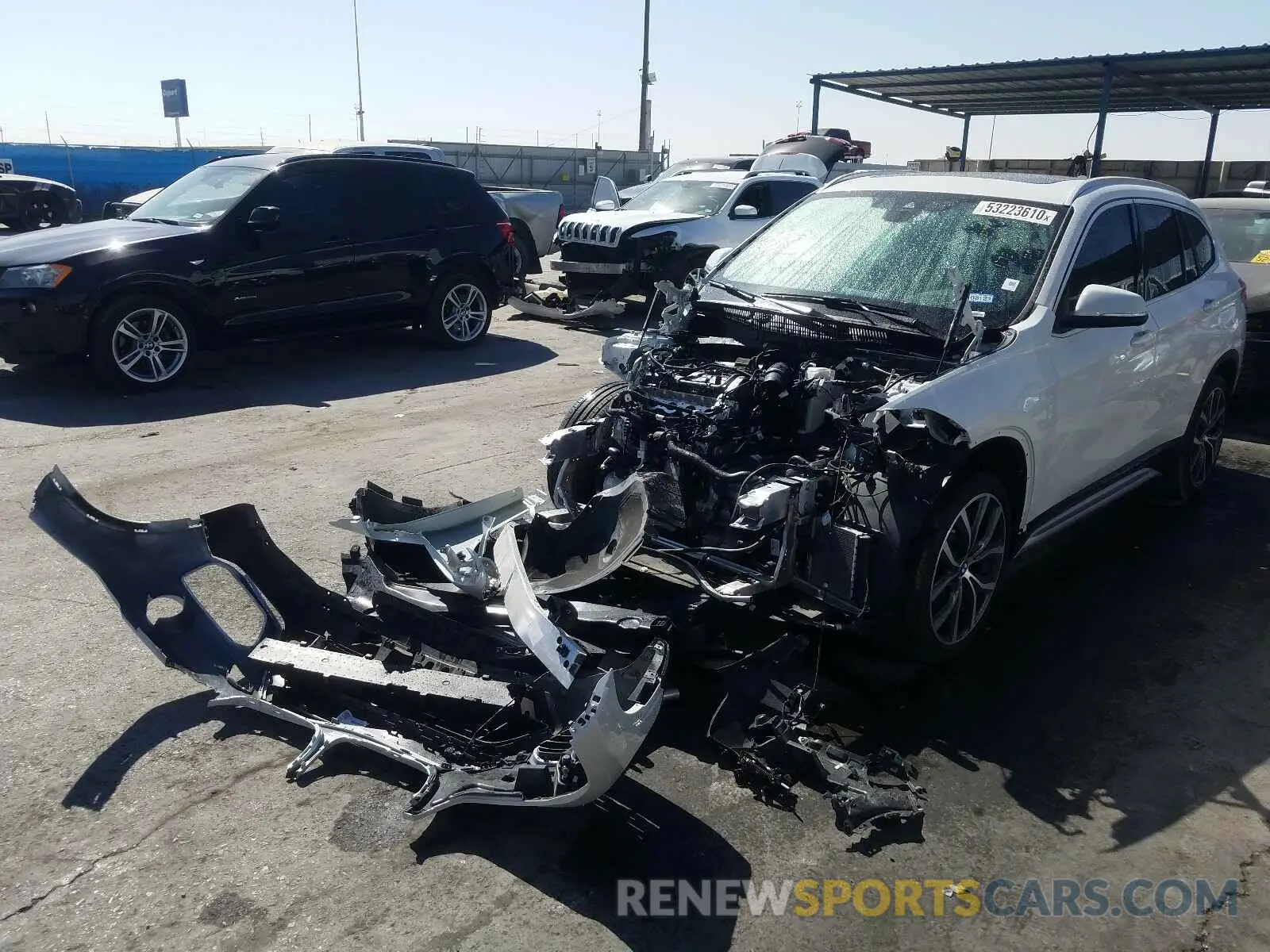 2 fotografías del automóvil dañado WBXHU7C54K3H45686 BMW X1 2019