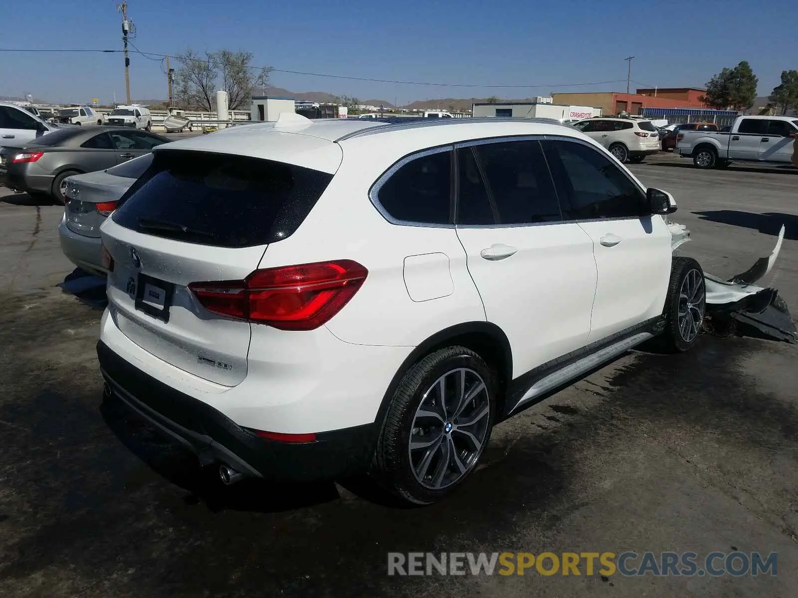 4 fotografías del automóvil dañado WBXHU7C54K3H45686 BMW X1 2019