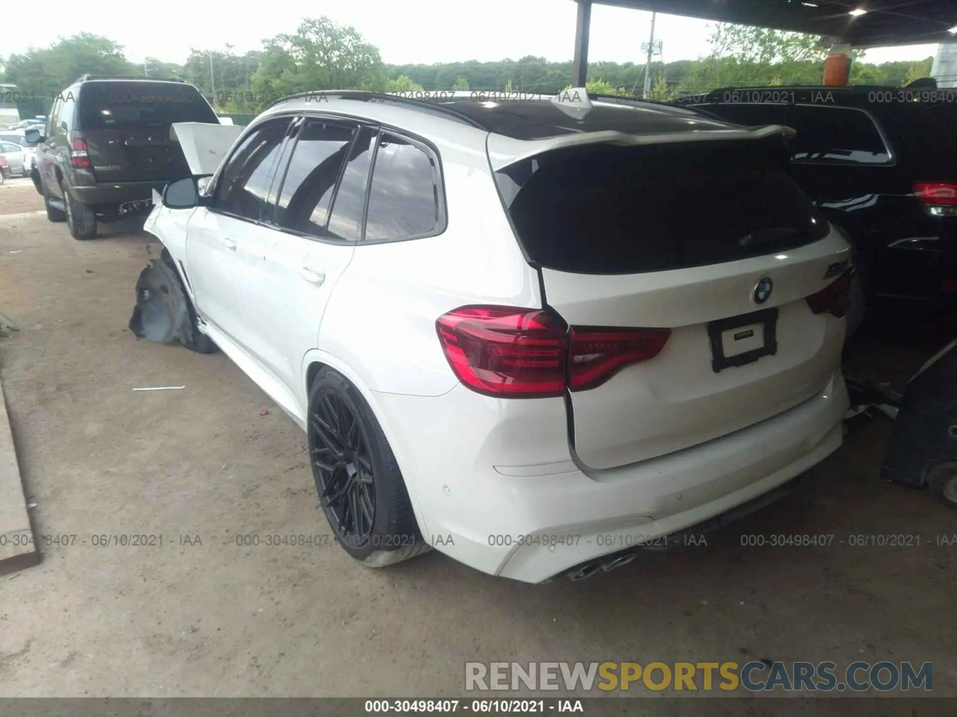 3 fotografías del automóvil dañado 5YMTS0C07M9F00011 BMW X3 M 2021