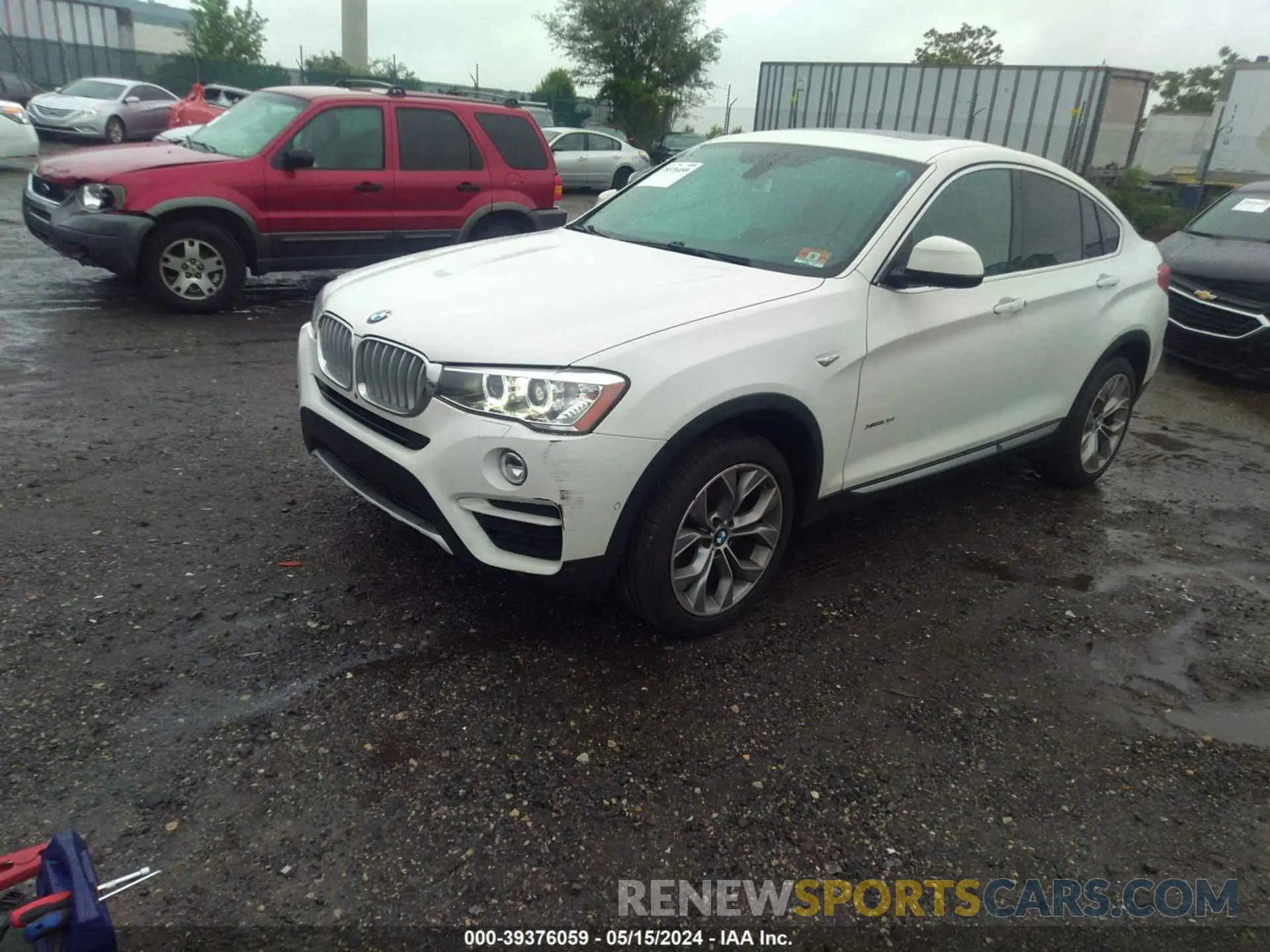 2 fotografías del automóvil dañado 5UXXW3C56J0T81018 BMW X4 2018