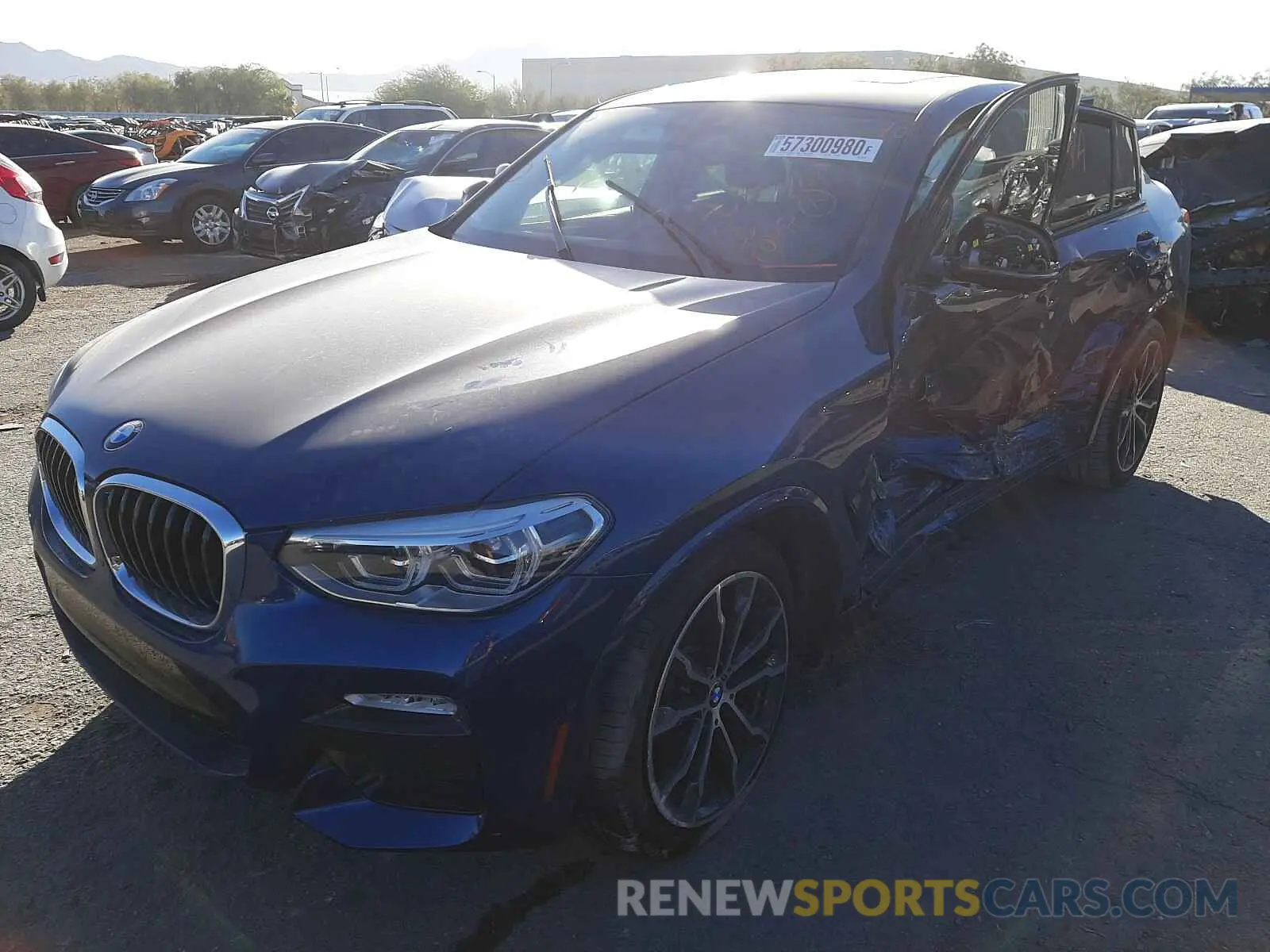2 fotografías del automóvil dañado 5UXUJ3C52KLA58346 BMW X4 2019