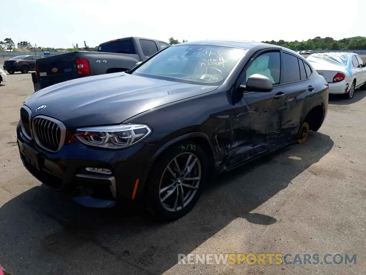 2 fotografías del automóvil dañado 5UXUJ5C58K9A32889 BMW X4 2019