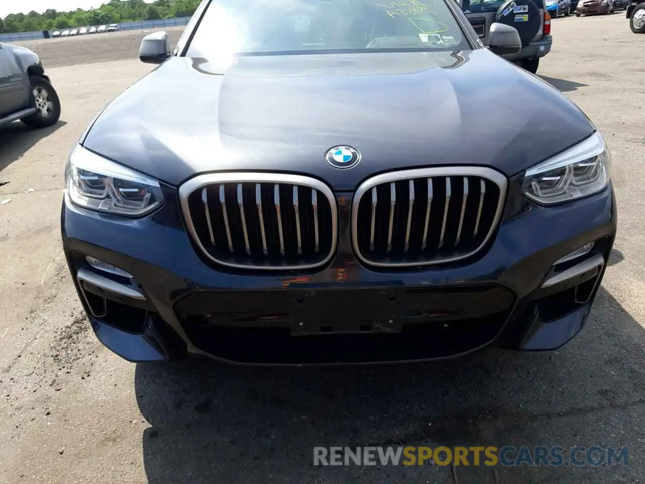 7 fotografías del automóvil dañado 5UXUJ5C58K9A32889 BMW X4 2019