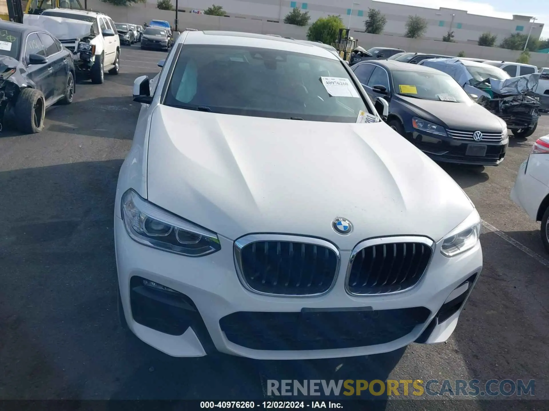 12 fotografías del automóvil dañado 5UX2V1C07LLE67612 BMW X4 2020