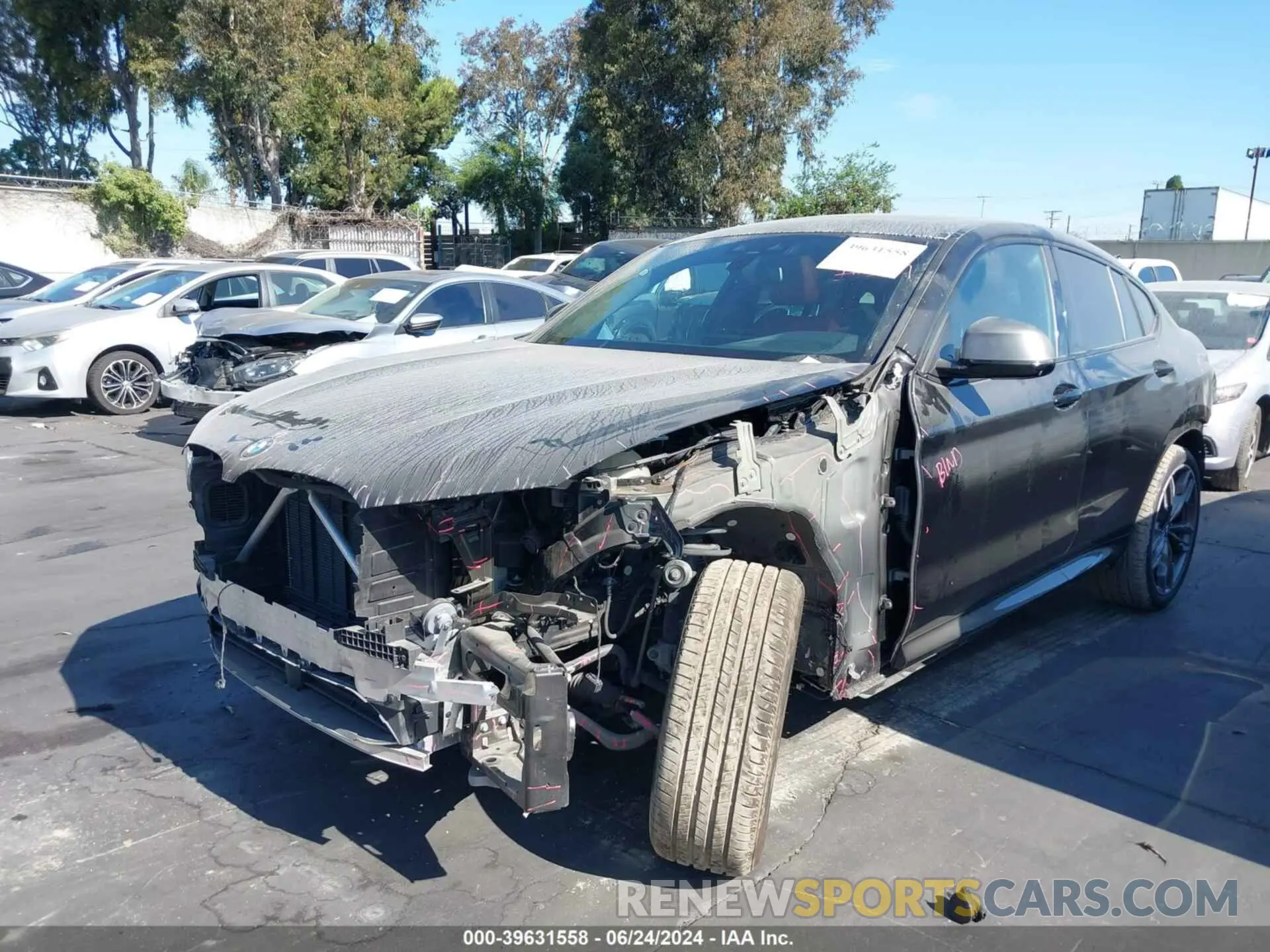 2 fotografías del automóvil dañado 5UX2V5C09M9E71182 BMW X4 2021