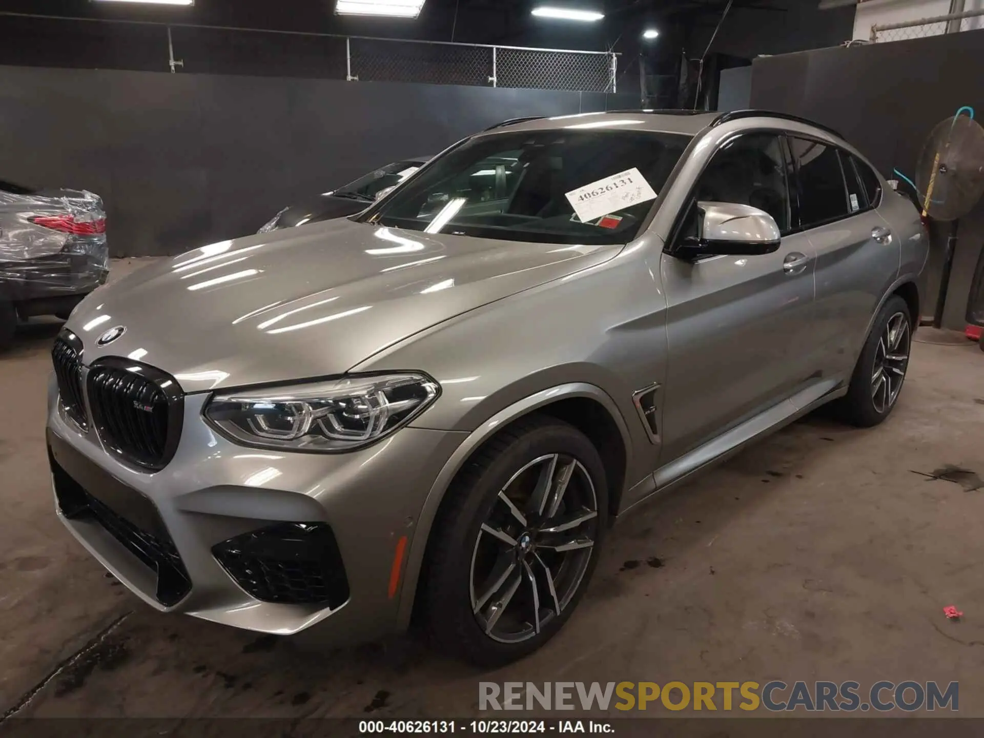 2 fotografías del automóvil dañado 5YMUJ0C09M9D82678 BMW X4 M 2021