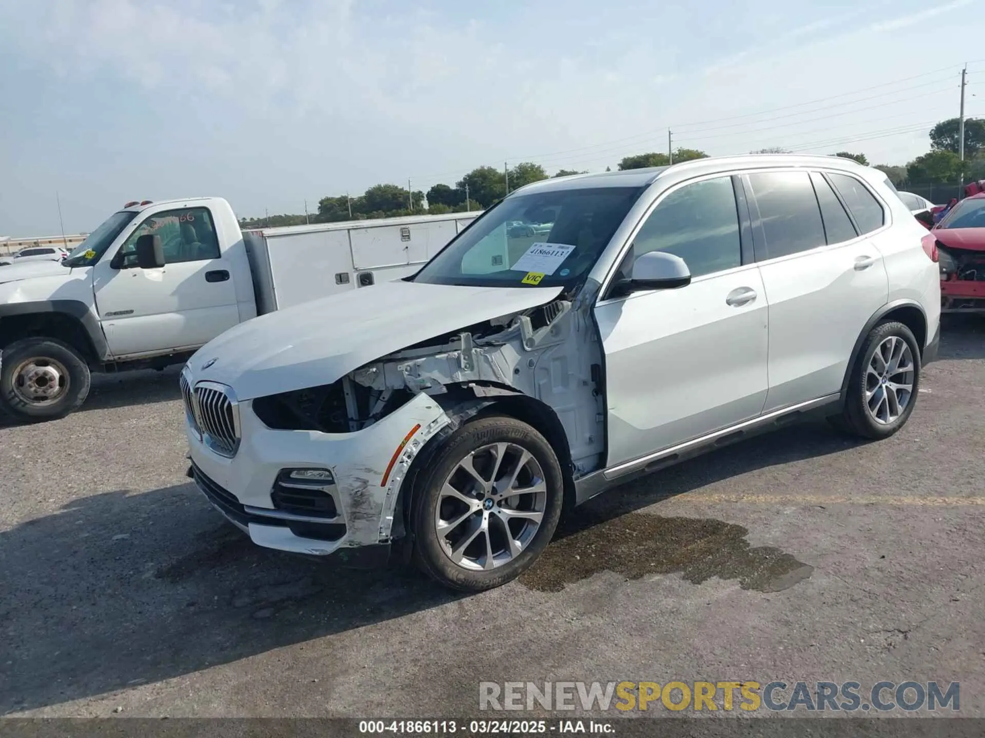 2 fotografías del automóvil dañado 5UXCR6C50KLL04572 BMW X5 2019