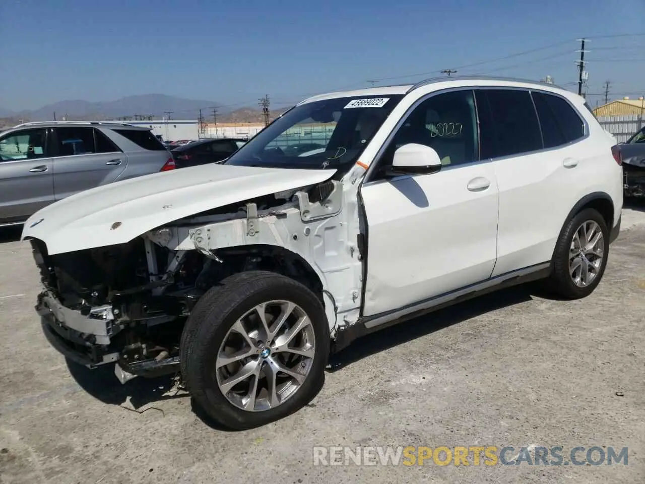 2 fotografías del automóvil dañado 5UXCR6C51KLL53053 BMW X5 2019
