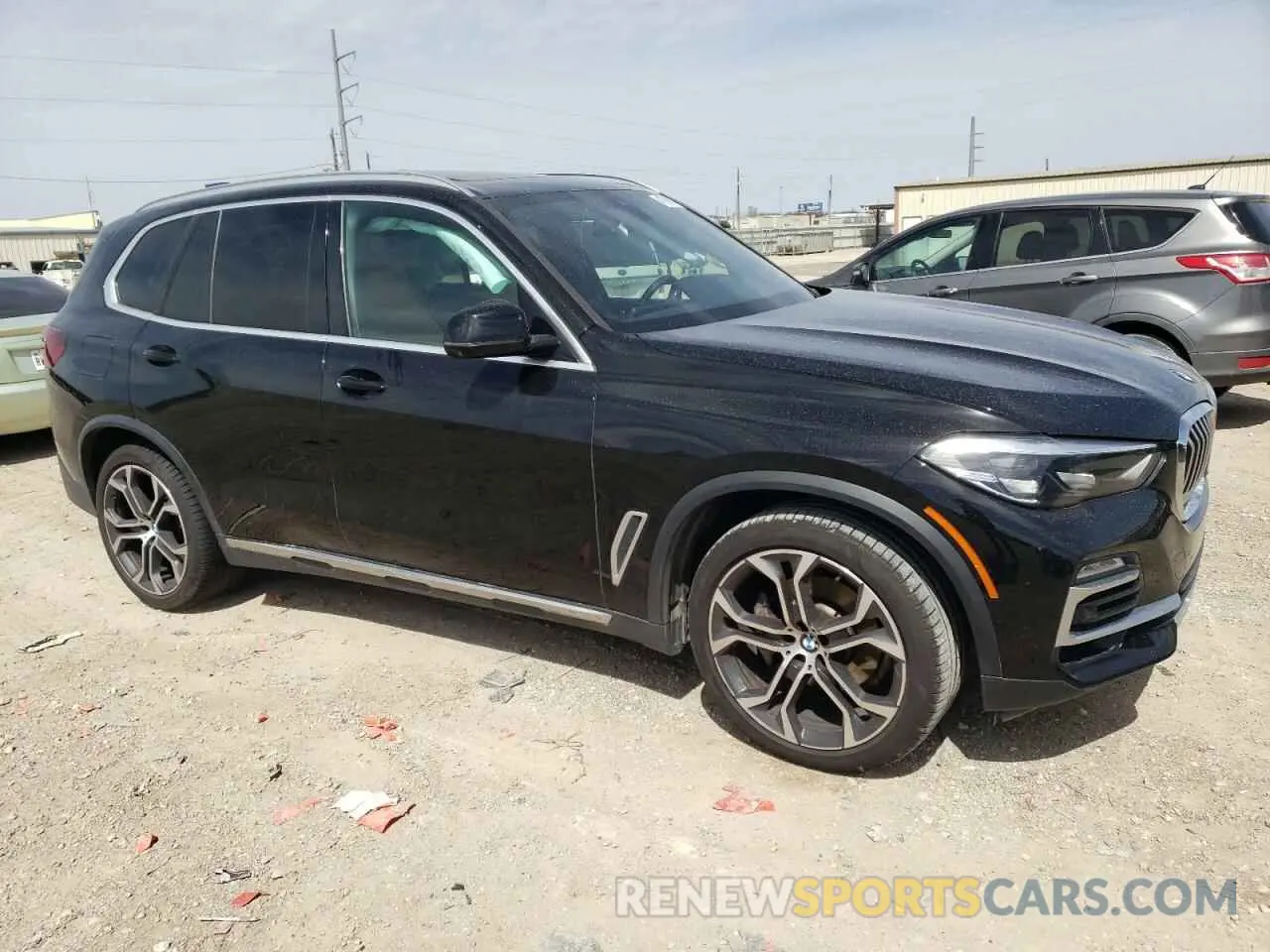 4 fotografías del automóvil dañado 5UXCR4C05M9G60740 BMW X5 2021